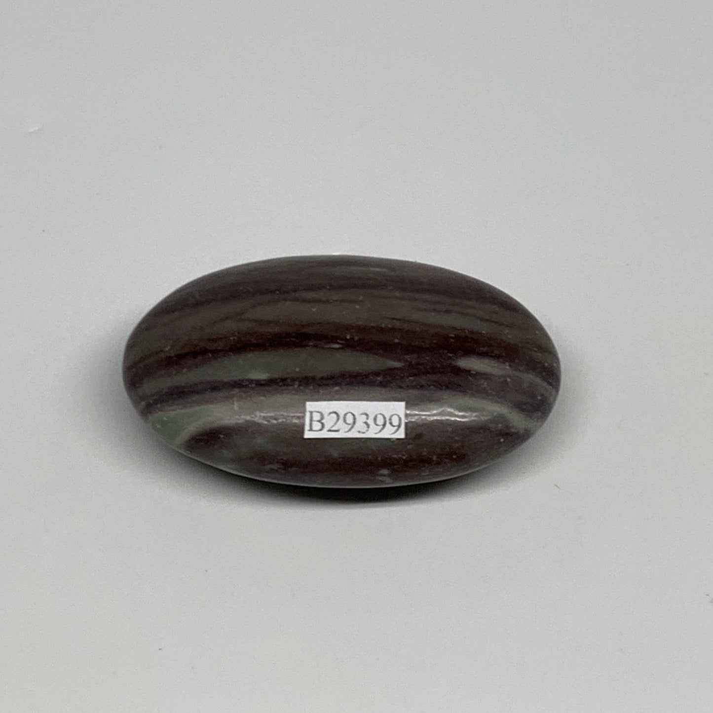 76.6g, 2.5"x1.6"x0.8", Narmada Shiva Lingam Palm-Stone Polished, B29399