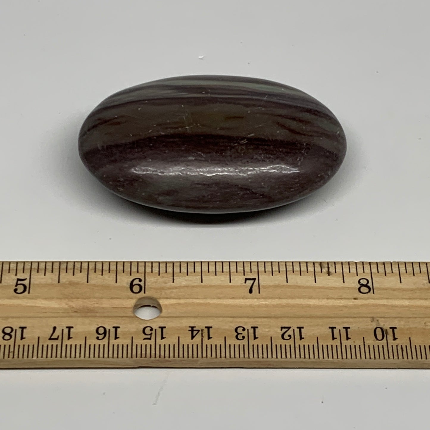 76.6g, 2.5"x1.6"x0.8", Narmada Shiva Lingam Palm-Stone Polished, B29399