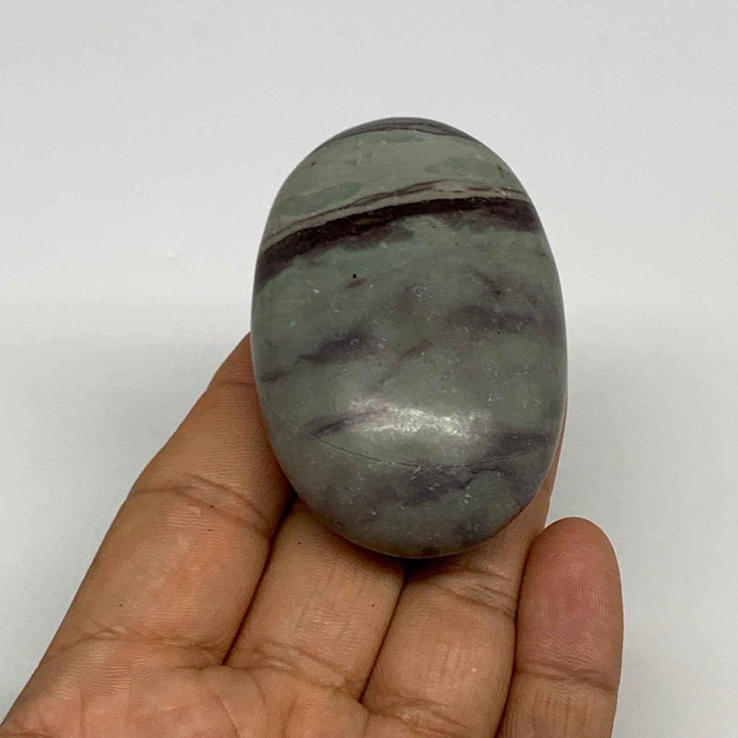 100g,  2.5"x1.7"x1", Narmada Shiva Lingam Palm-Stone Polished, B29400