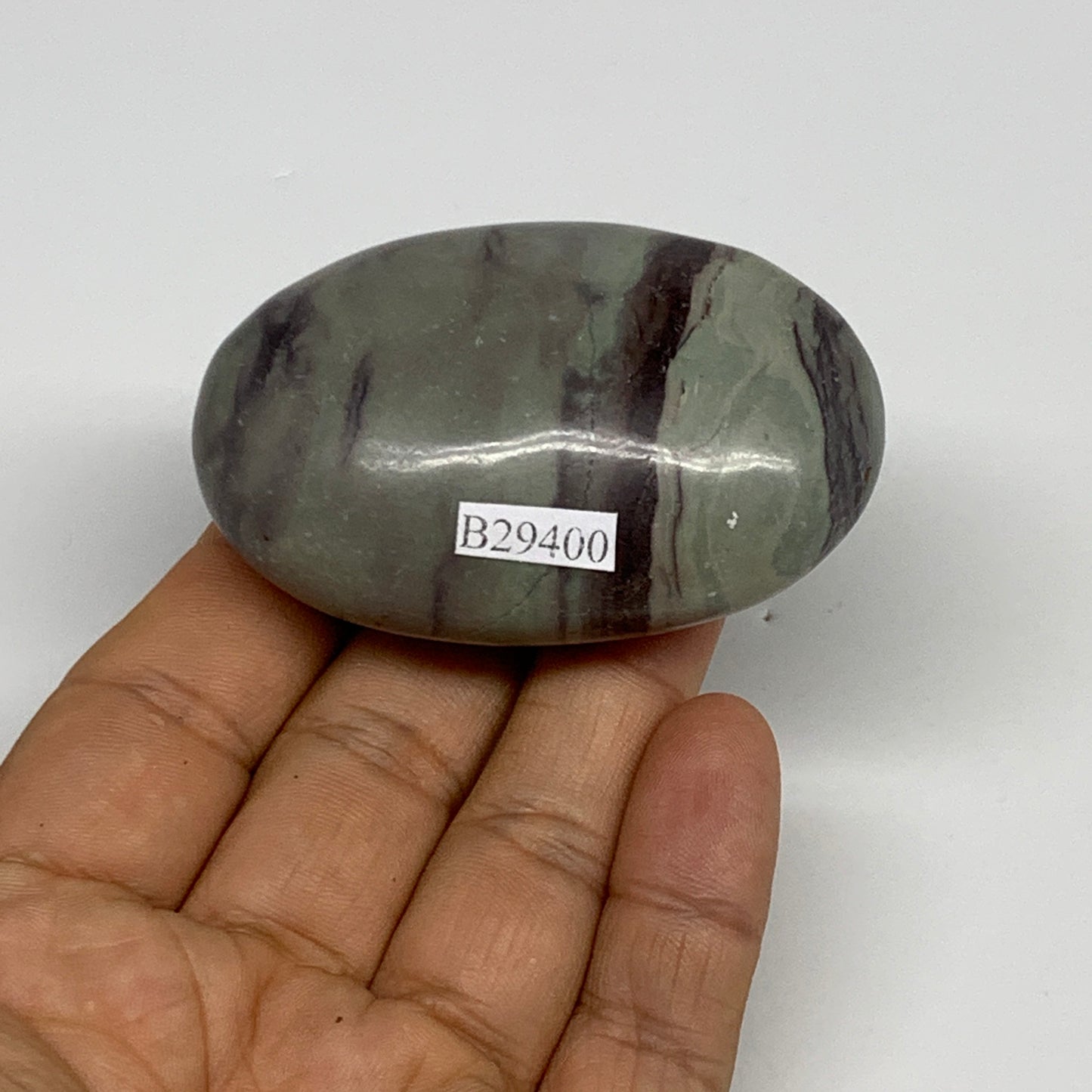 100g,  2.5"x1.7"x1", Narmada Shiva Lingam Palm-Stone Polished, B29400