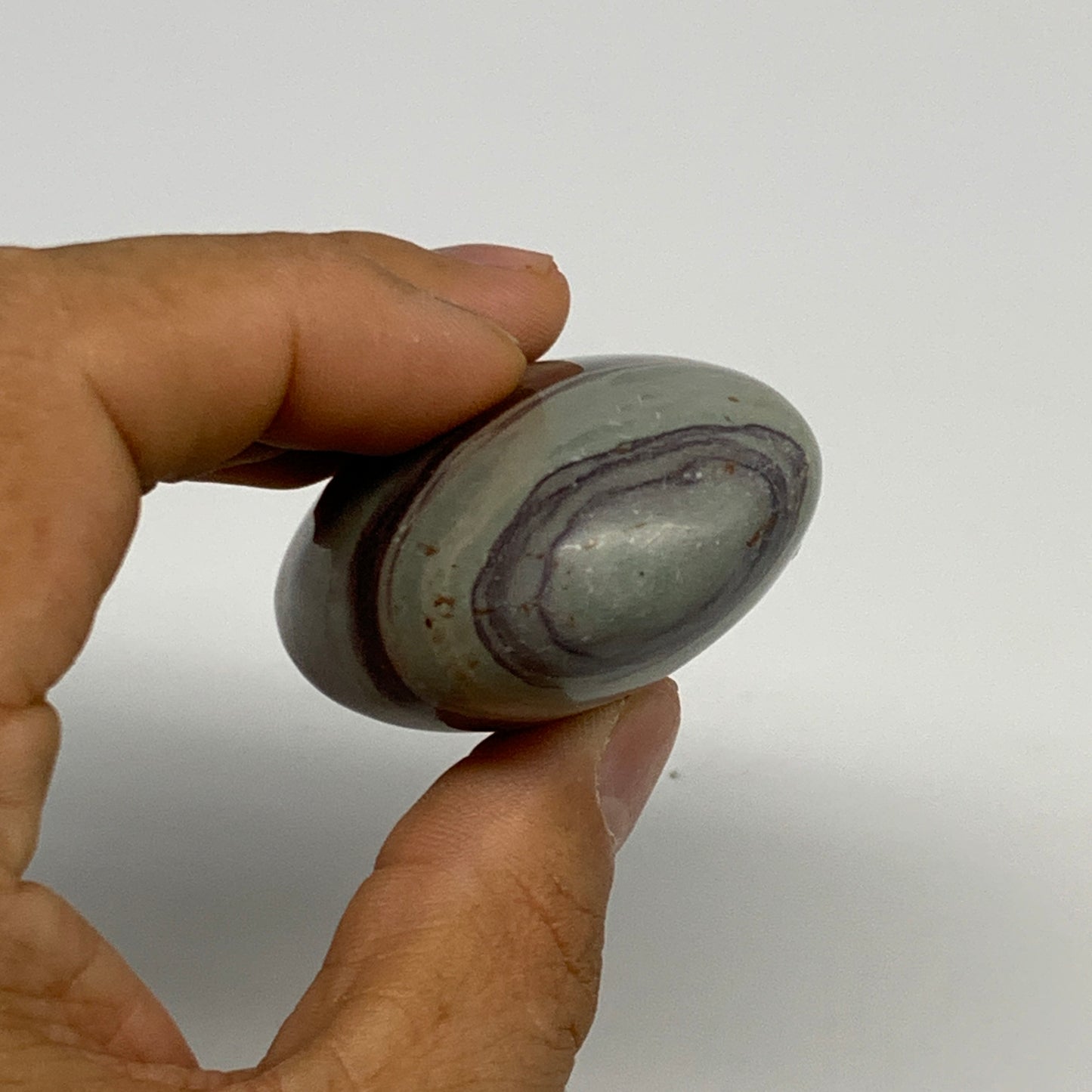 100g,  2.5"x1.7"x1", Narmada Shiva Lingam Palm-Stone Polished, B29400