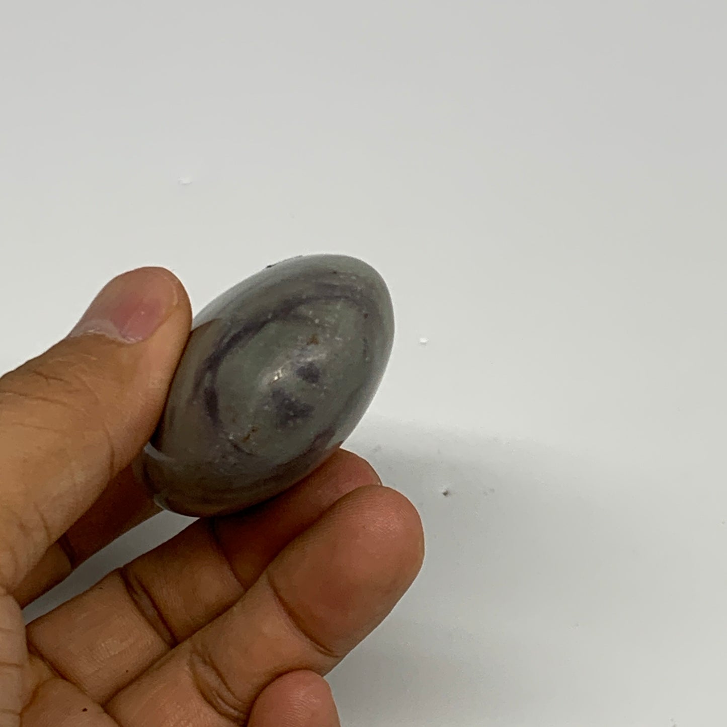 100g,  2.5"x1.7"x1", Narmada Shiva Lingam Palm-Stone Polished, B29400