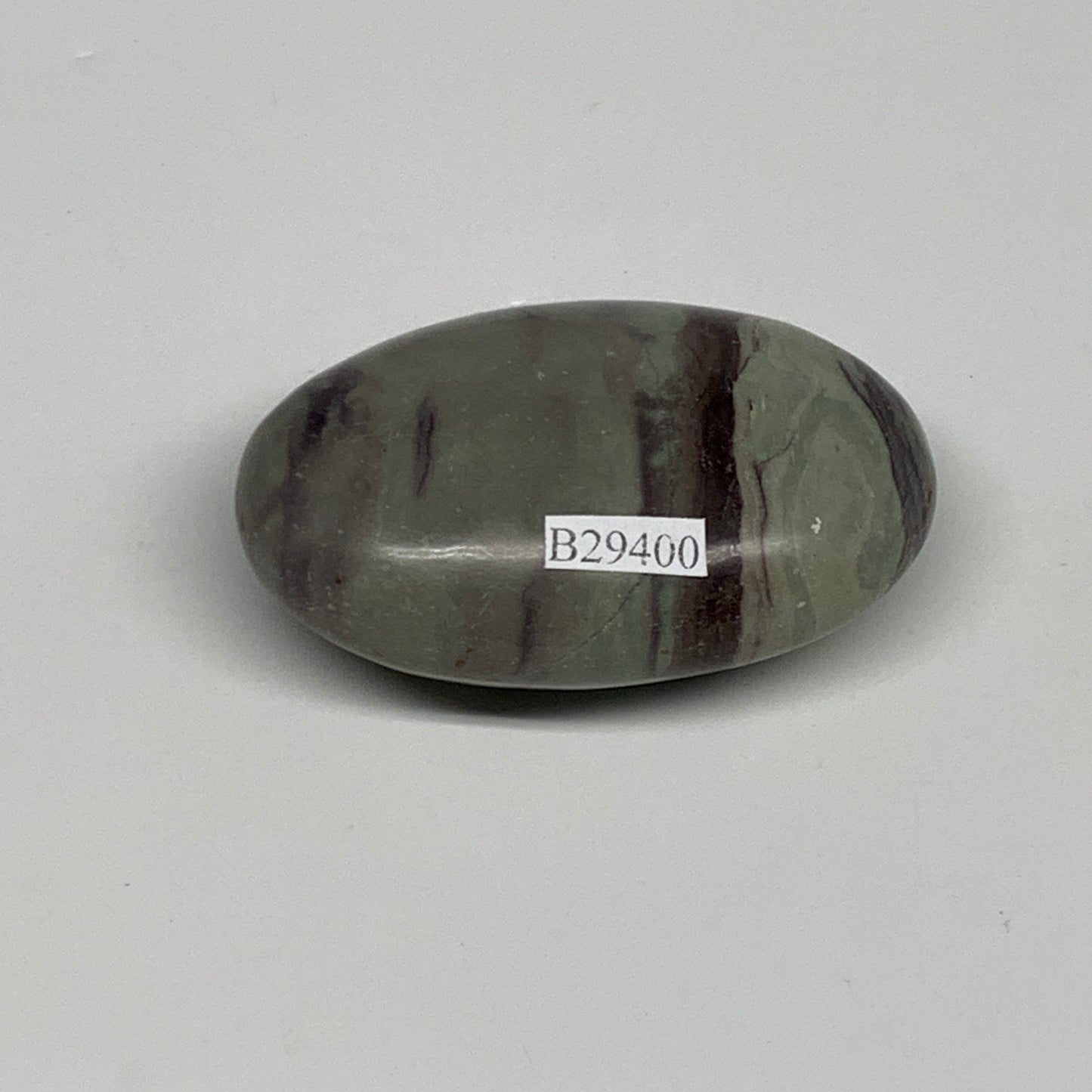 100g,  2.5"x1.7"x1", Narmada Shiva Lingam Palm-Stone Polished, B29400
