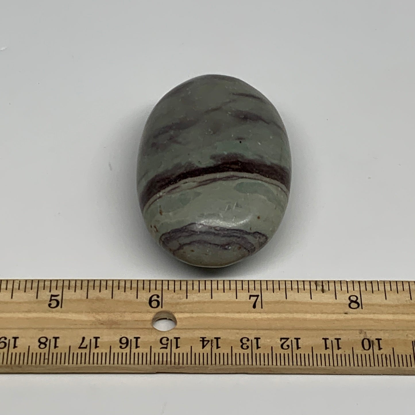 100g,  2.5"x1.7"x1", Narmada Shiva Lingam Palm-Stone Polished, B29400