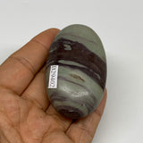76.8g,  2.5"x1.5"x0.9", Narmada Shiva Lingam Palm-Stone Polished, B29402