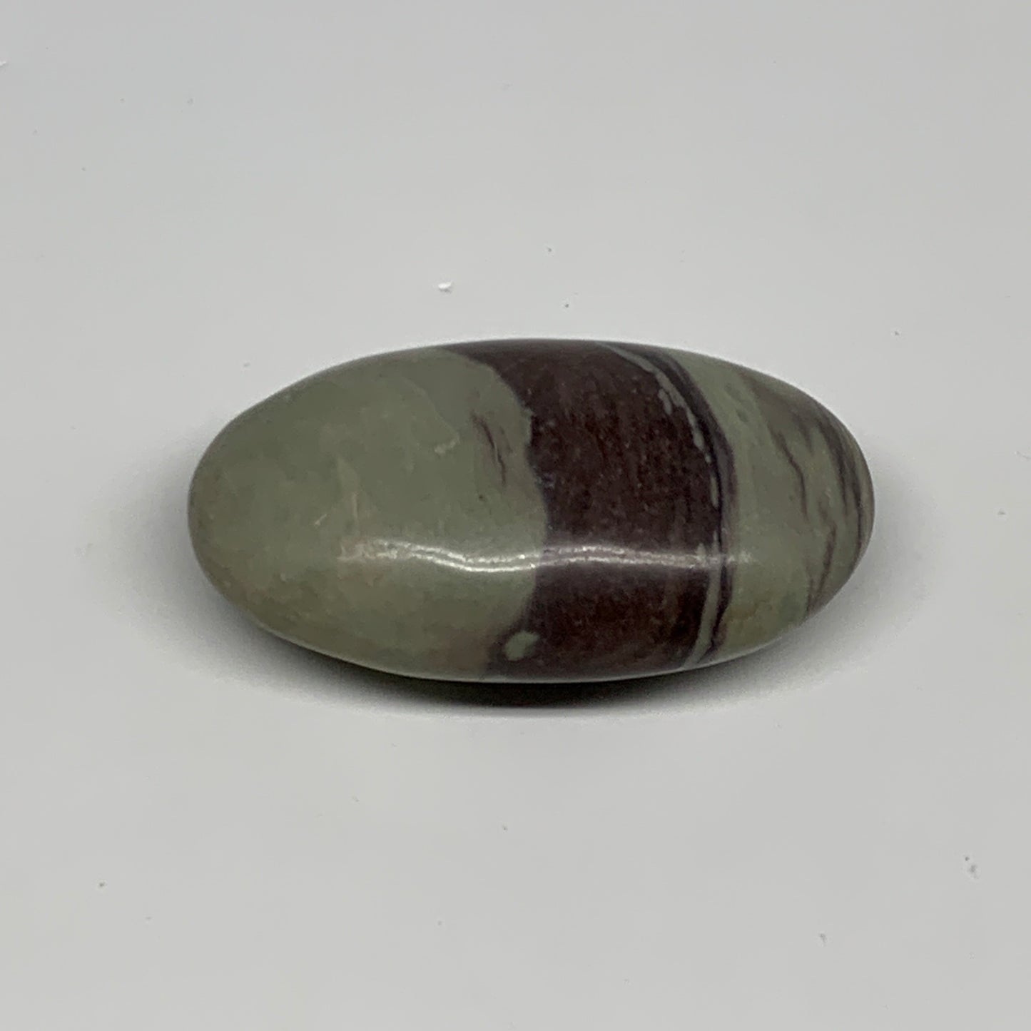 76.8g,  2.5"x1.5"x0.9", Narmada Shiva Lingam Palm-Stone Polished, B29402