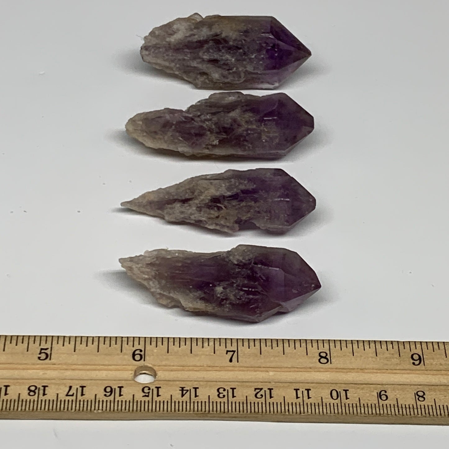 102.9g, 2.2" - 2.3", 4pcs, Amethyst Point Polished Rough lower part, B32384