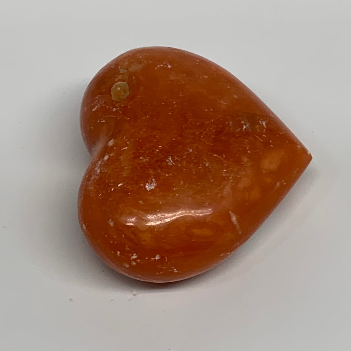 125.2g, 2.2"x2.6"x1.1" Orange Calcite Heart Gemstones from Madagascar, B33766