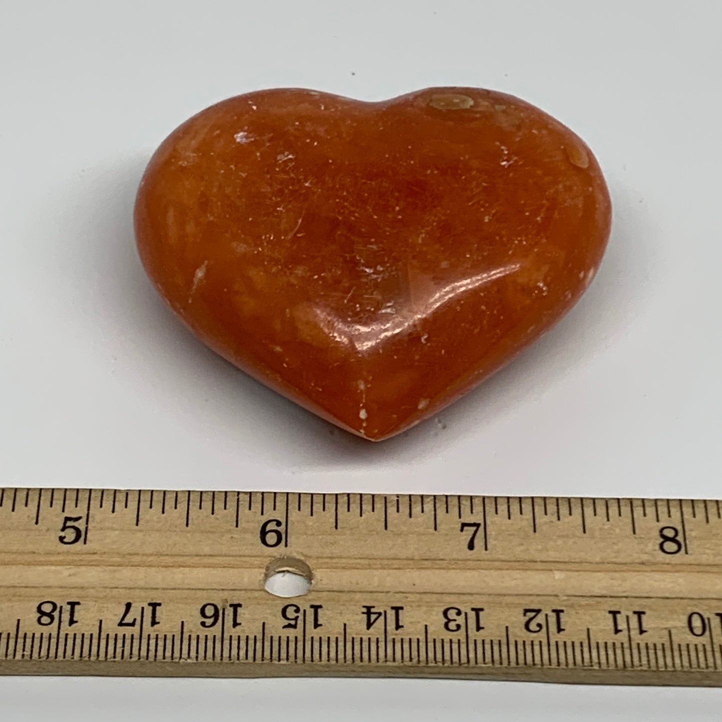 125.2g, 2.2"x2.6"x1.1" Orange Calcite Heart Gemstones from Madagascar, B33766
