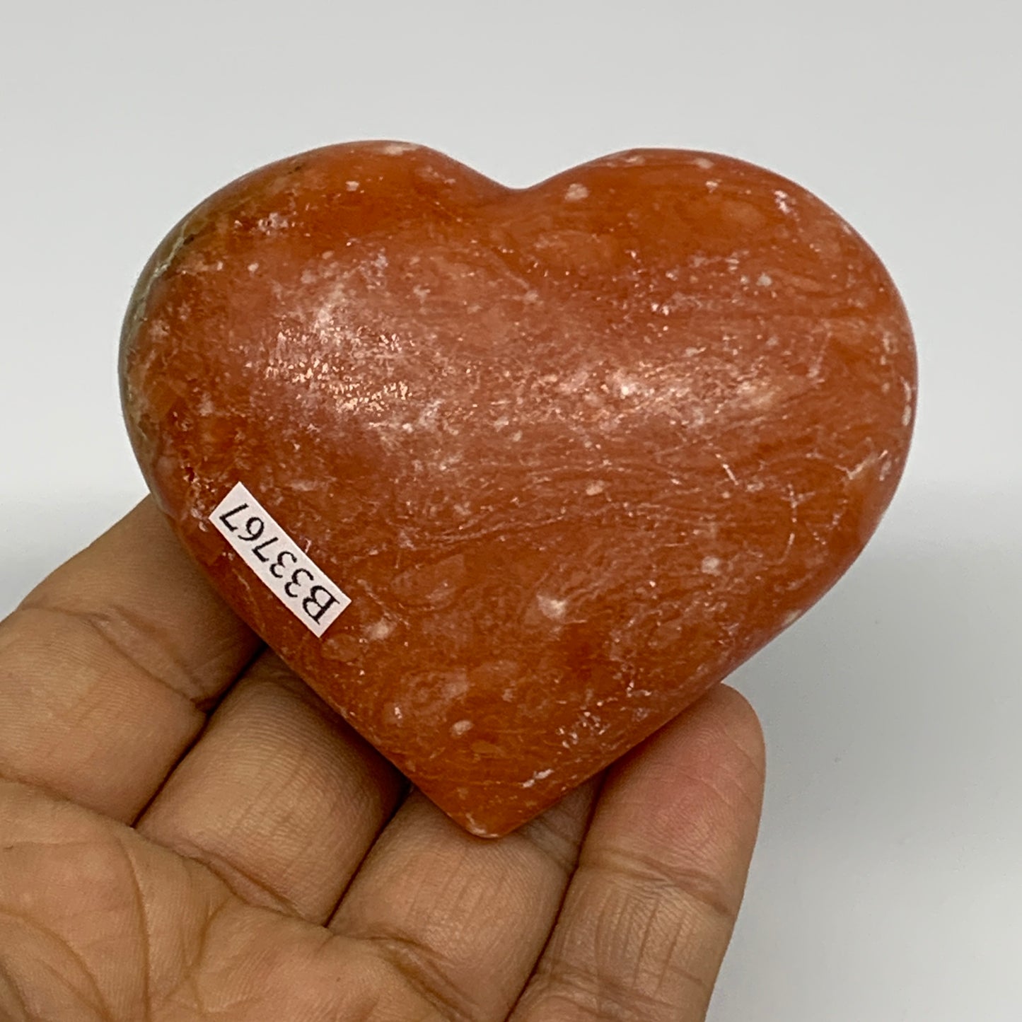 145.1g, 2.4"x2.8"x1.1" Orange Calcite Heart Gemstones from Madagascar, B33767