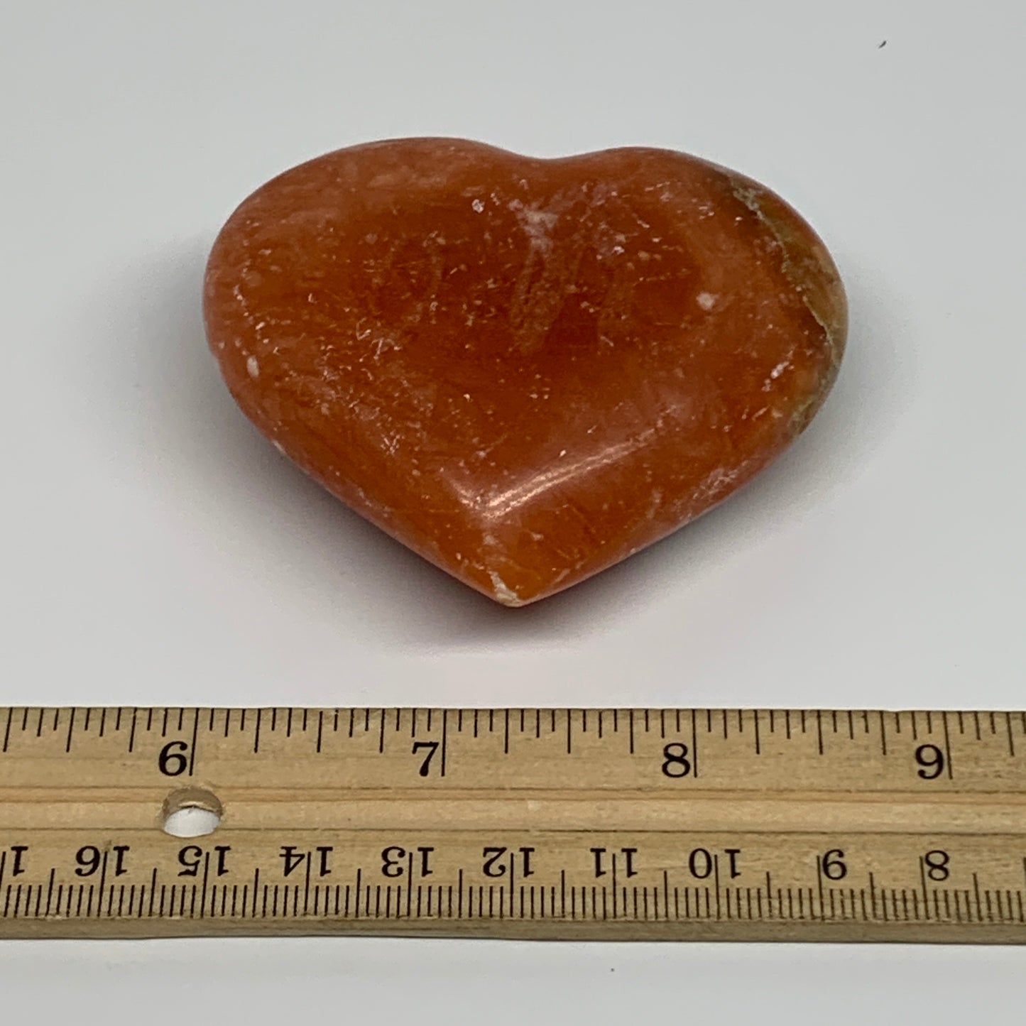145.1g, 2.4"x2.8"x1.1" Orange Calcite Heart Gemstones from Madagascar, B33767