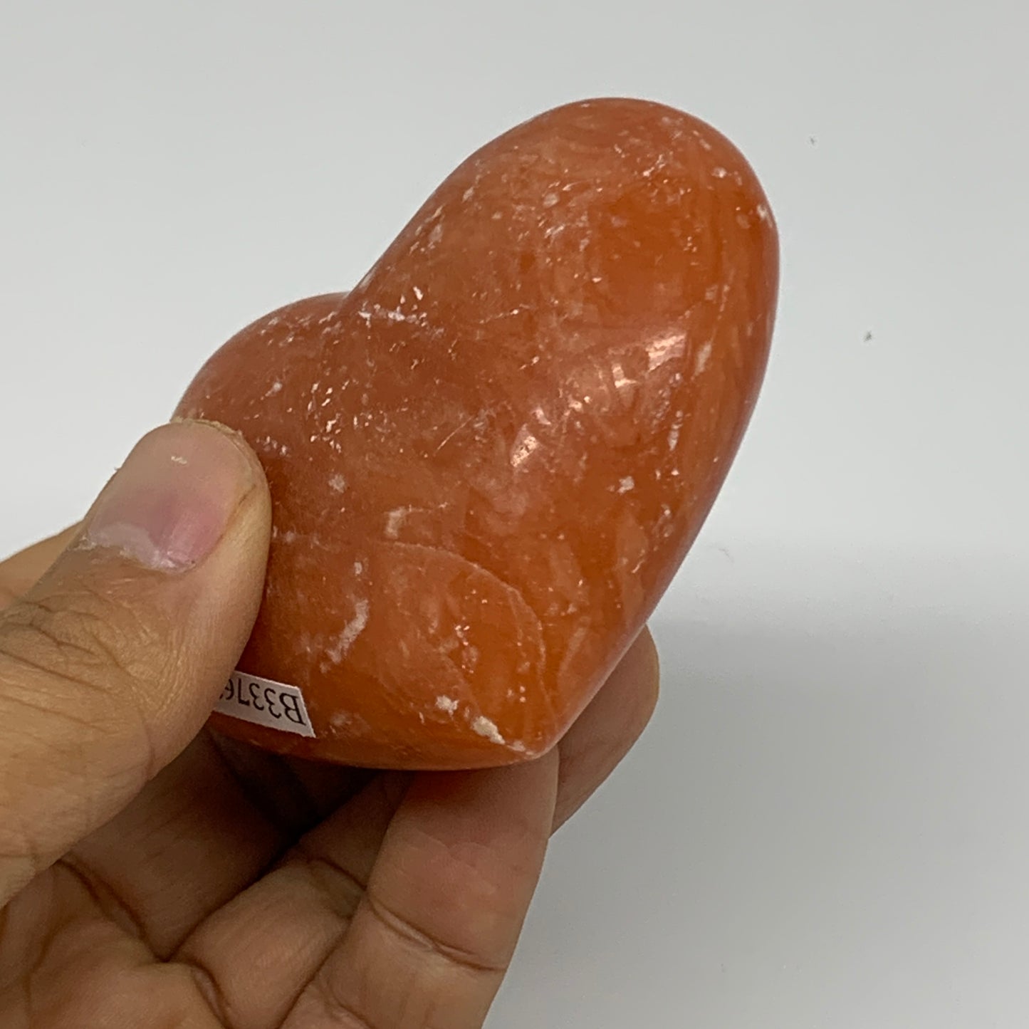 152g, 2.3"x2.8"x1.2" Orange Calcite Heart Gemstones from Madagascar, B33769