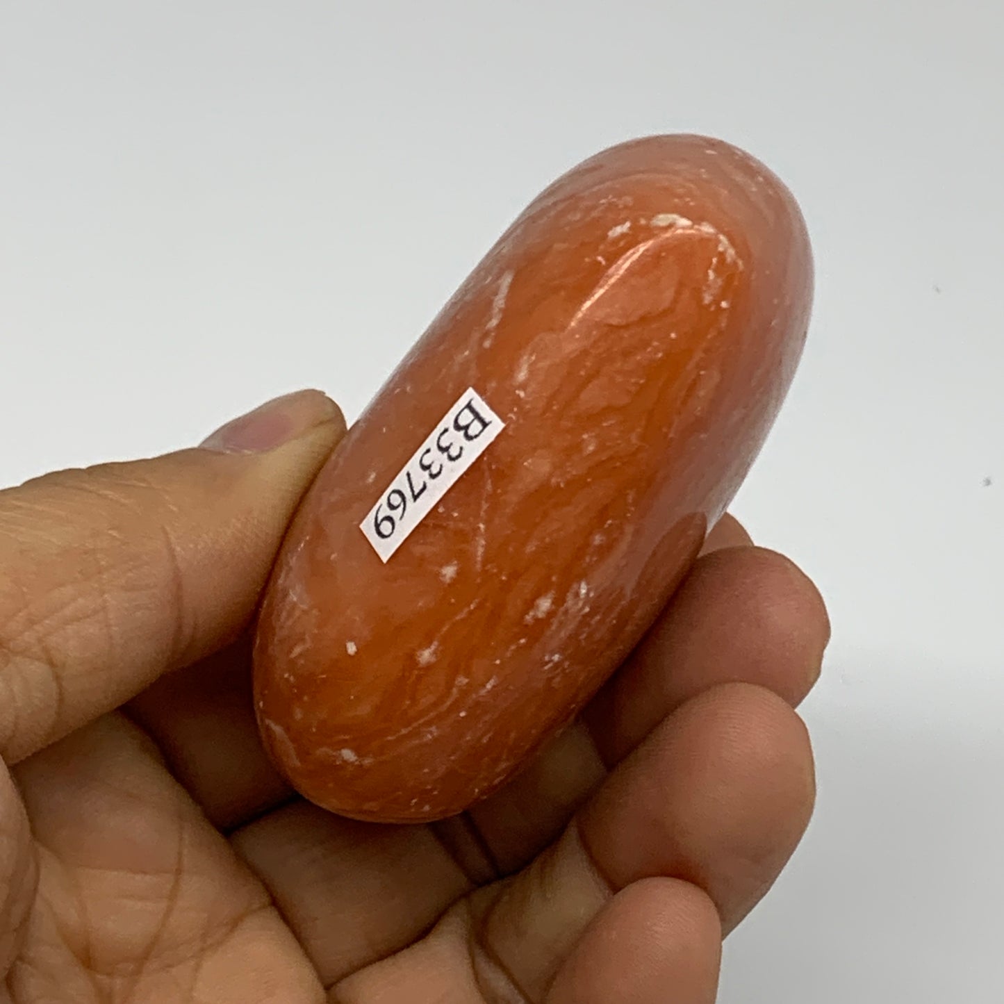 152g, 2.3"x2.8"x1.2" Orange Calcite Heart Gemstones from Madagascar, B33769