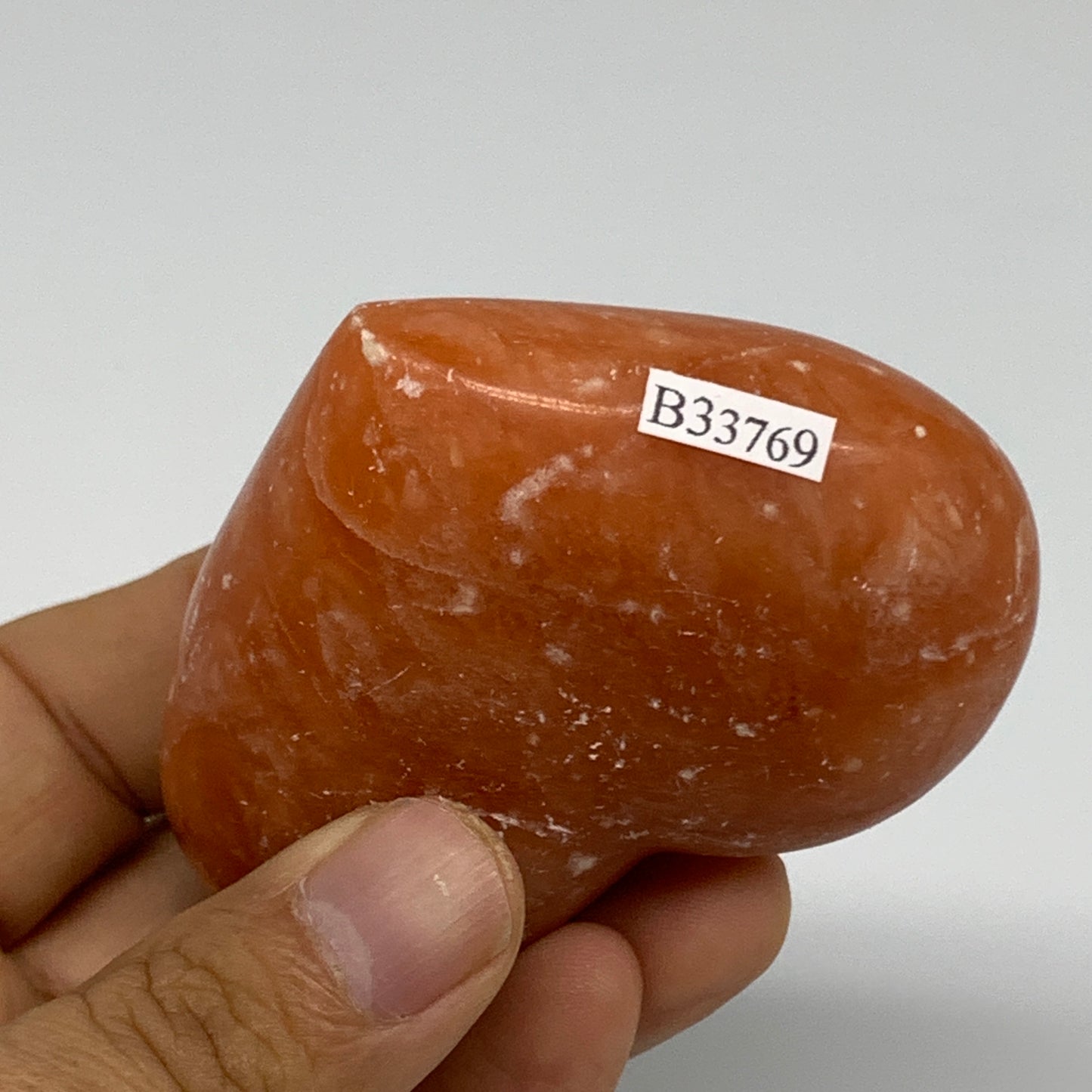 152g, 2.3"x2.8"x1.2" Orange Calcite Heart Gemstones from Madagascar, B33769