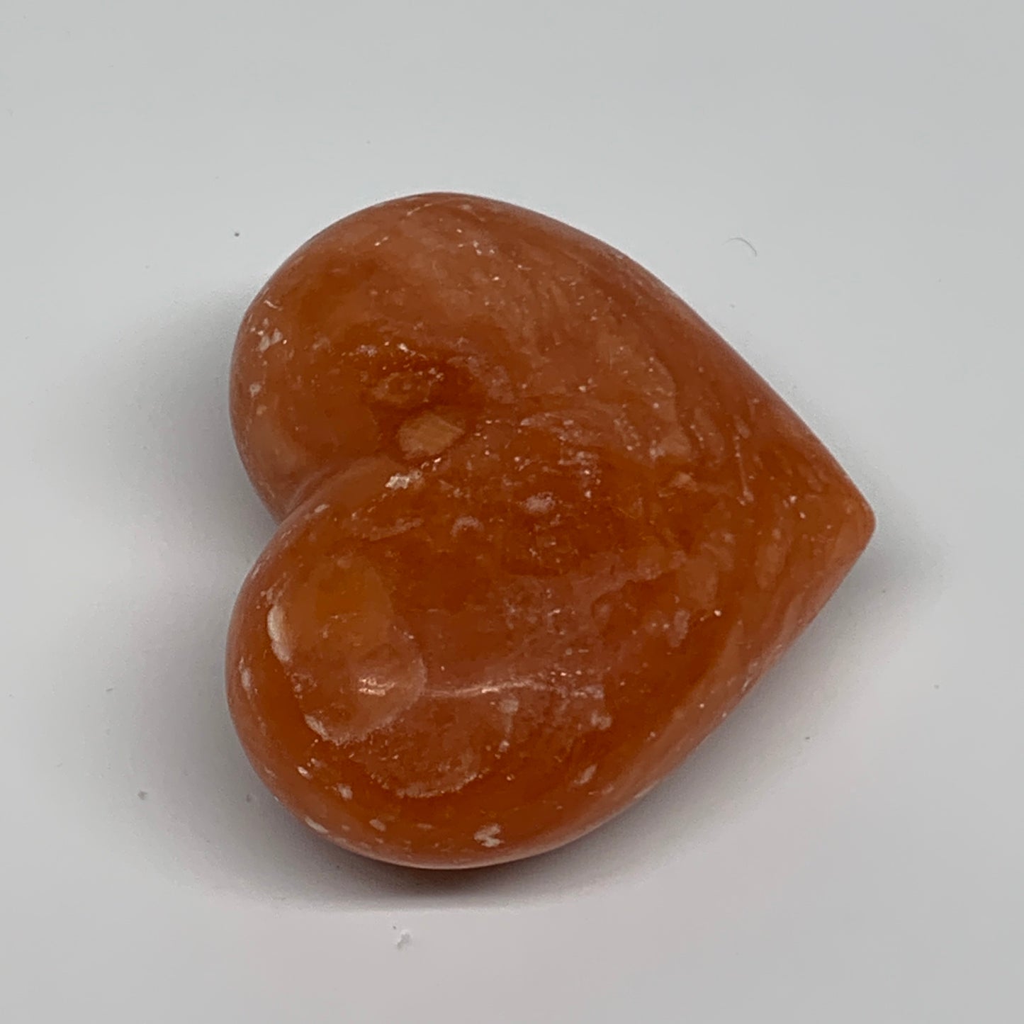 152g, 2.3"x2.8"x1.2" Orange Calcite Heart Gemstones from Madagascar, B33769