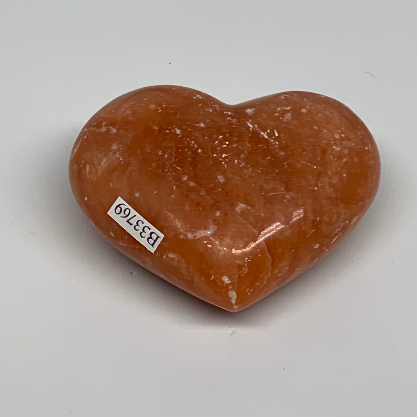 152g, 2.3"x2.8"x1.2" Orange Calcite Heart Gemstones from Madagascar, B33769