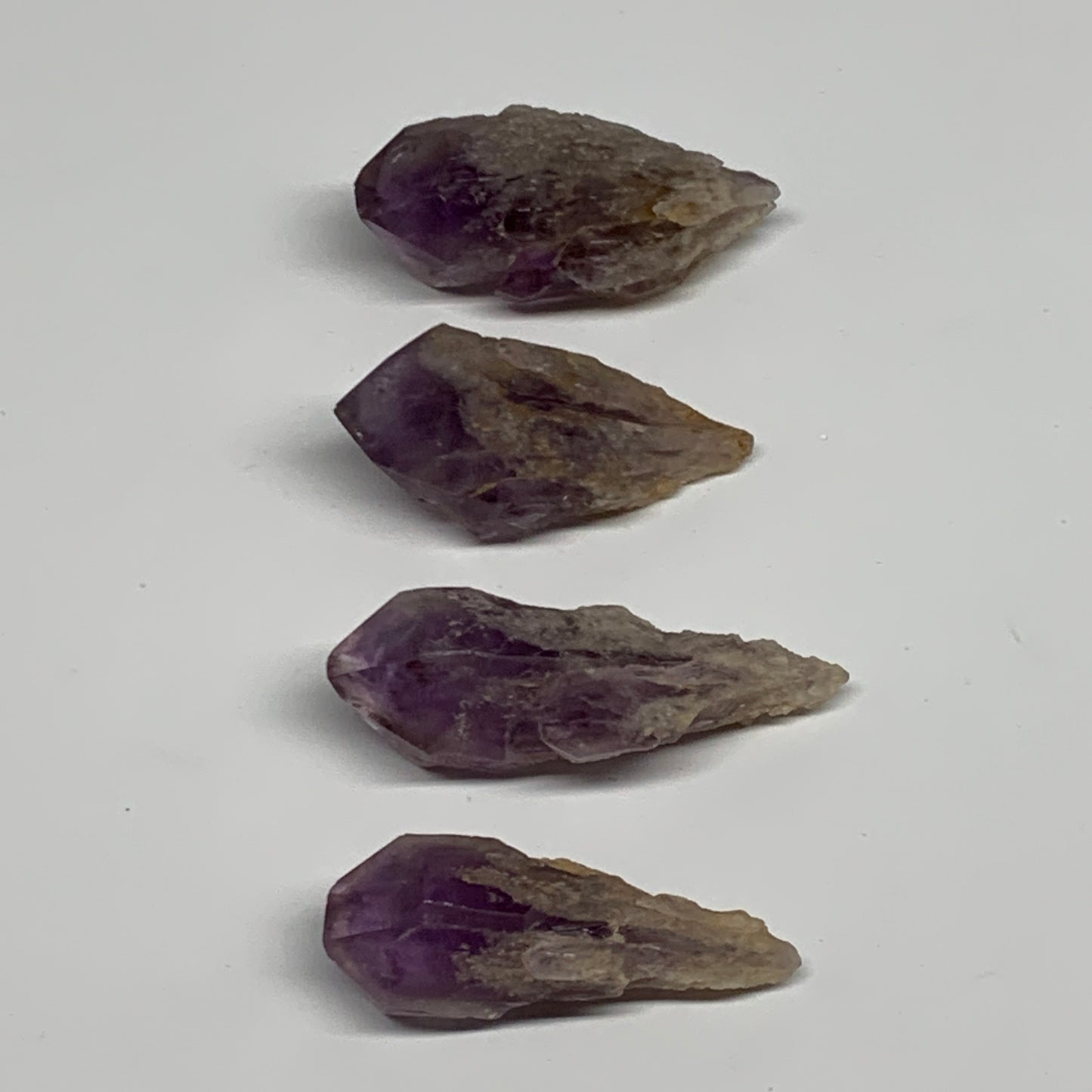 118.3g, 2.2" - 2.5", 4pcs, Amethyst Point Polished Rough lower part, B32394