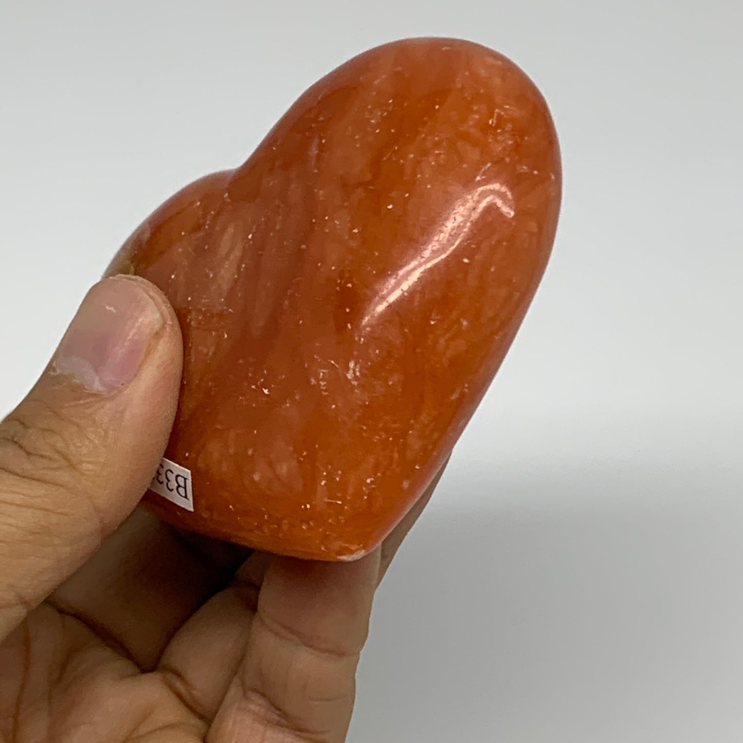 181g, 2.6"x3.1"x1.1" Orange Calcite Heart Gemstones from Madagascar, B33772