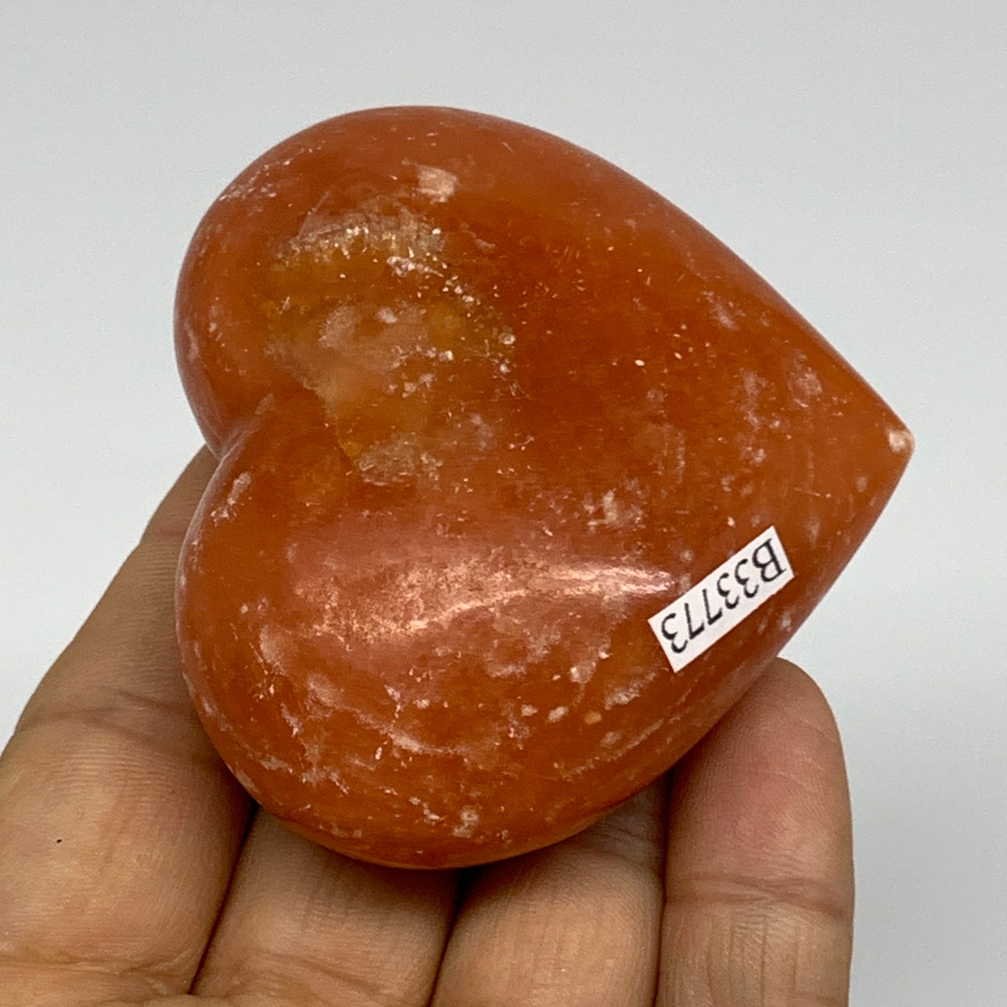 128g, 2.3"x2.6"x1.1" Orange Calcite Heart Gemstones from Madagascar, B33773
