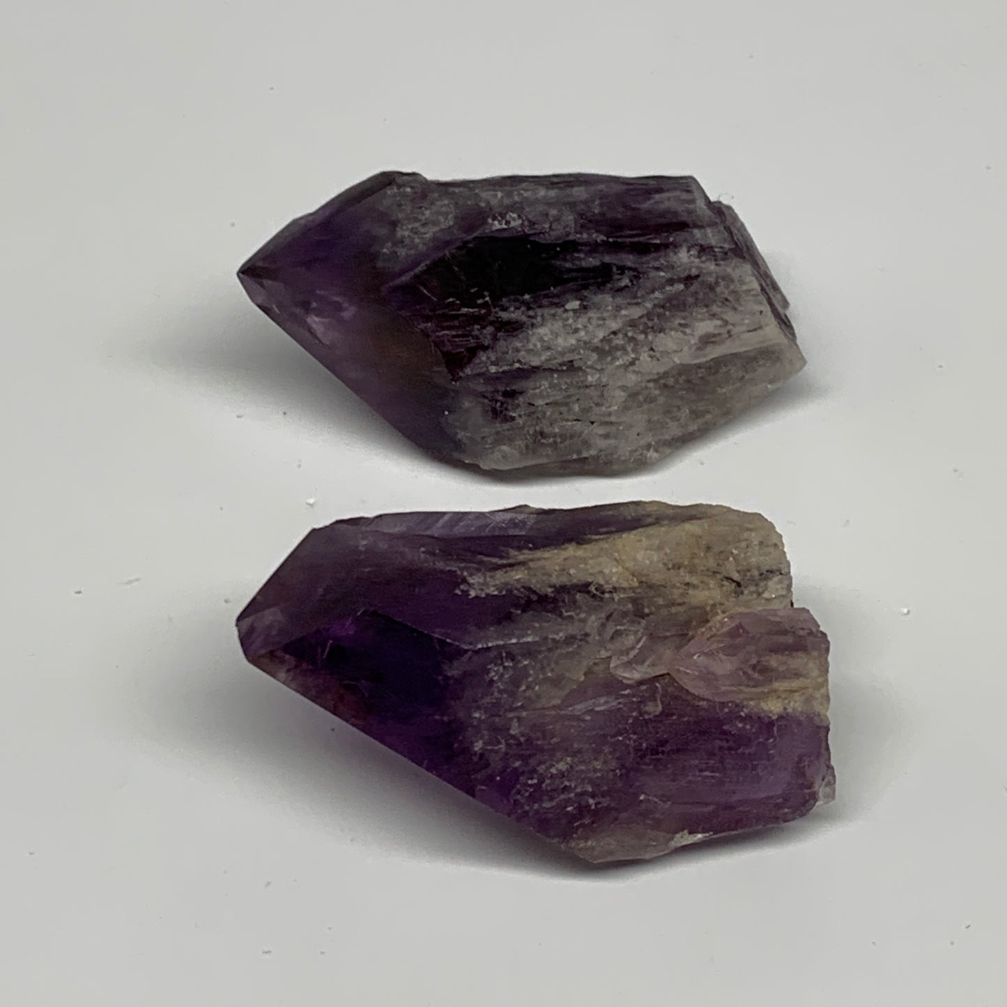 116.7g, 2" - 2.4", 2pcs, Amethyst Point Polished Rough lower part, B32397