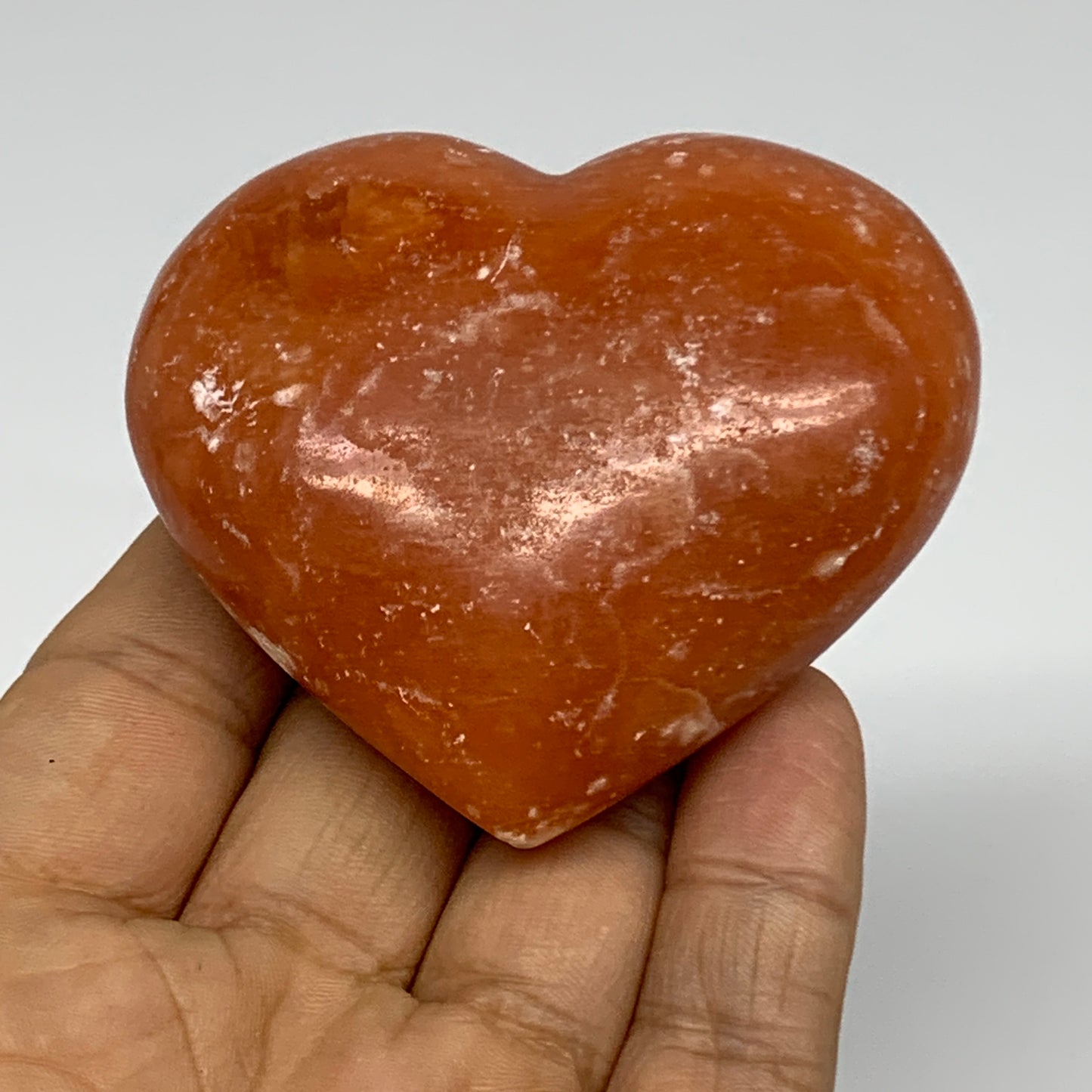 128g, 2.3"x2.6"x1.1" Orange Calcite Heart Gemstones from Madagascar, B33773
