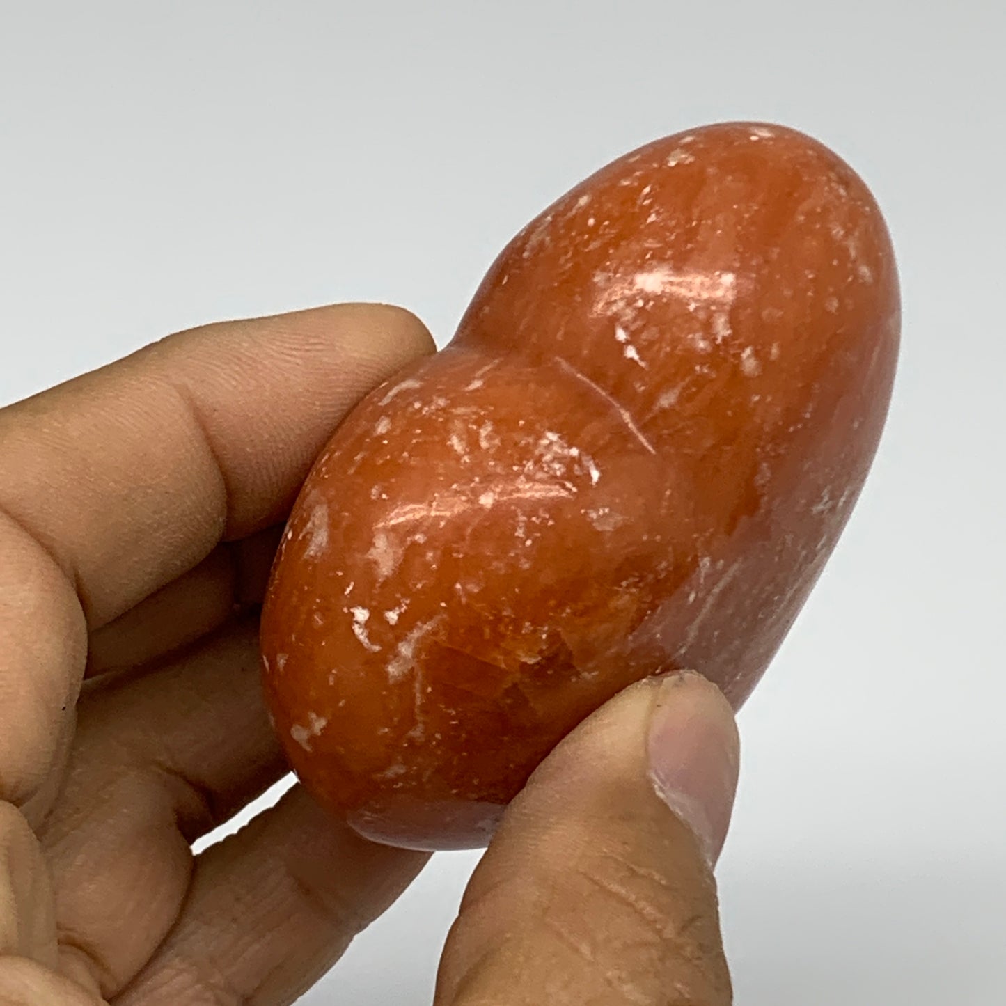 128g, 2.3"x2.6"x1.1" Orange Calcite Heart Gemstones from Madagascar, B33773