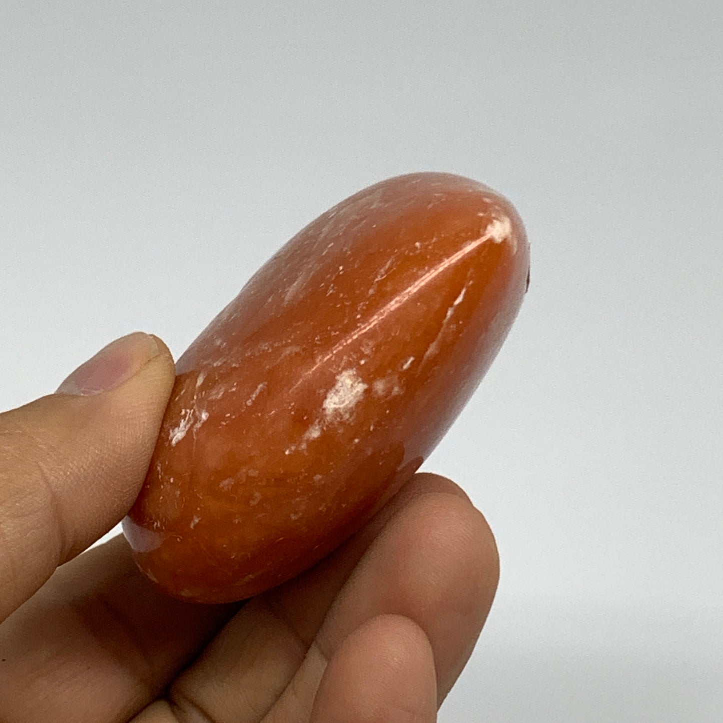 128g, 2.3"x2.6"x1.1" Orange Calcite Heart Gemstones from Madagascar, B33773