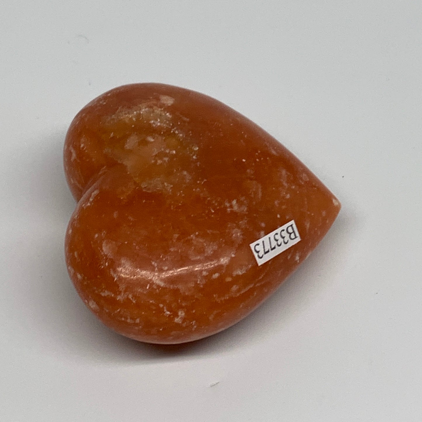 128g, 2.3"x2.6"x1.1" Orange Calcite Heart Gemstones from Madagascar, B33773