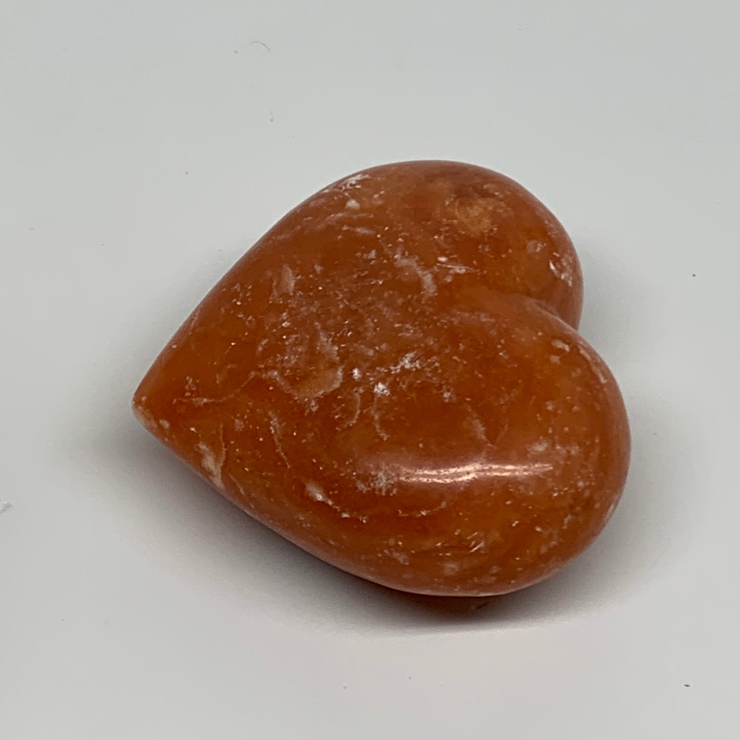 128g, 2.3"x2.6"x1.1" Orange Calcite Heart Gemstones from Madagascar, B33773