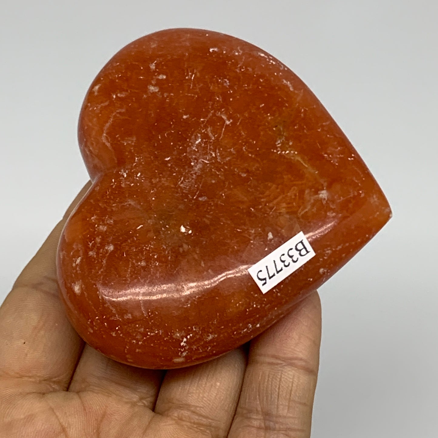 161.4g, 2.8"x3.2"x0.9" Orange Calcite Heart Gemstones from Madagascar, B33775