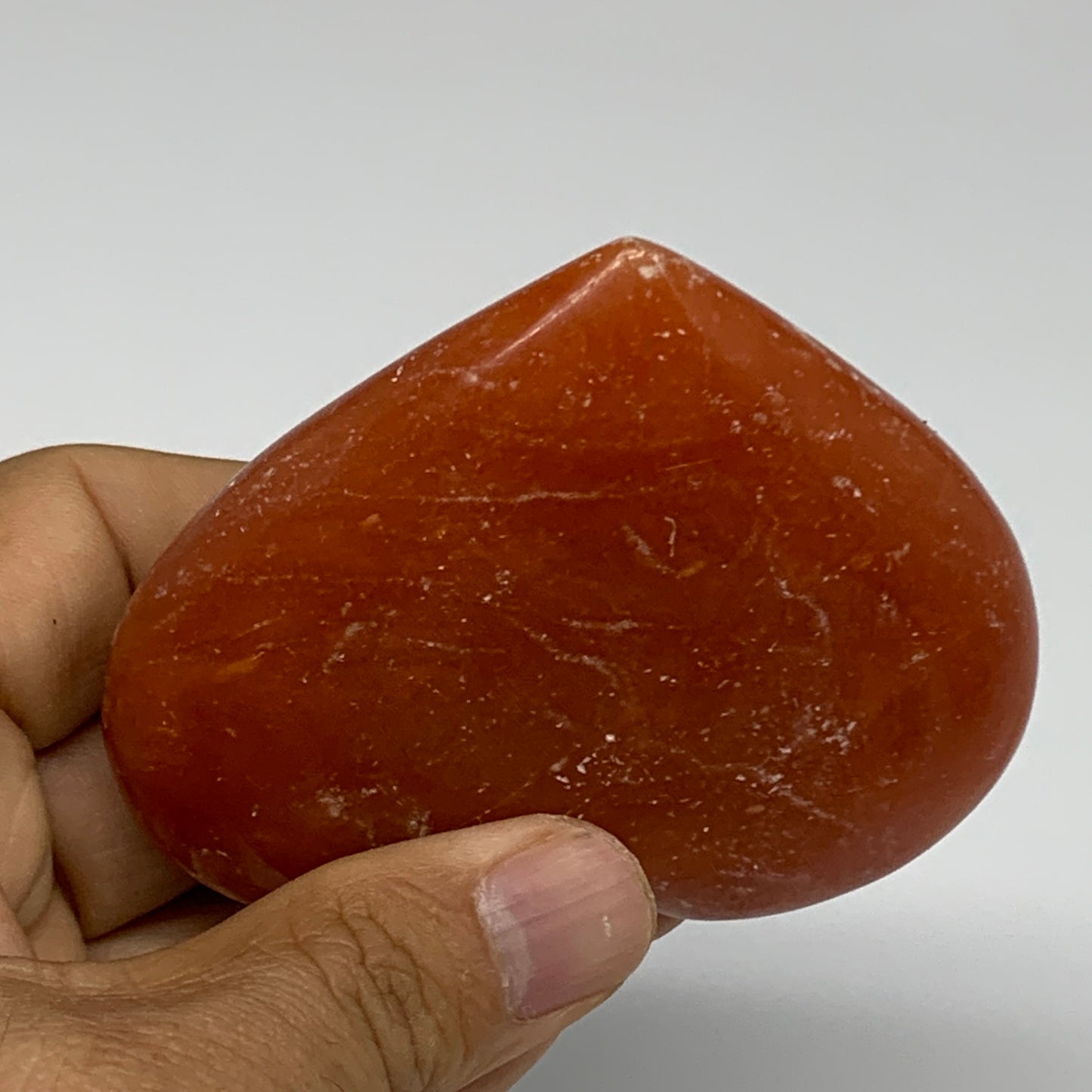 161.4g, 2.8"x3.2"x0.9" Orange Calcite Heart Gemstones from Madagascar, B33775