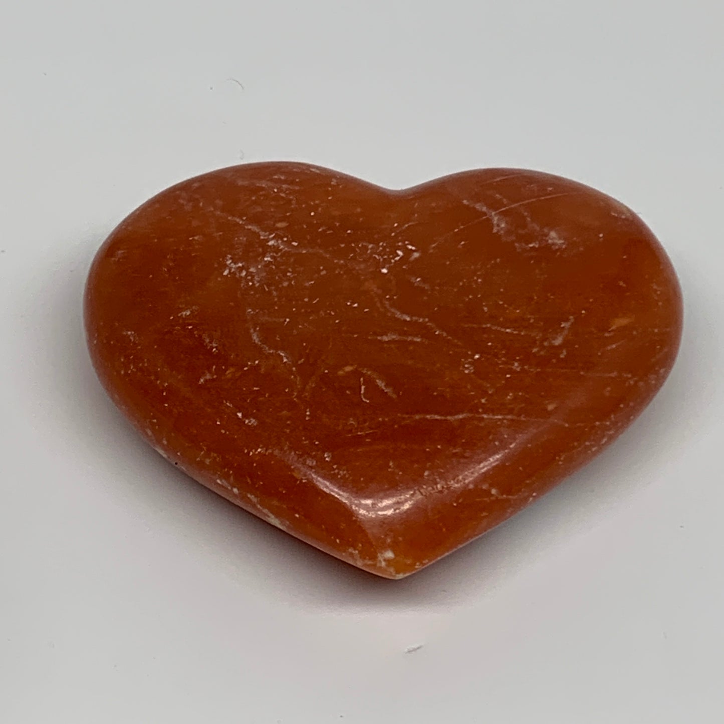 161.4g, 2.8"x3.2"x0.9" Orange Calcite Heart Gemstones from Madagascar, B33775