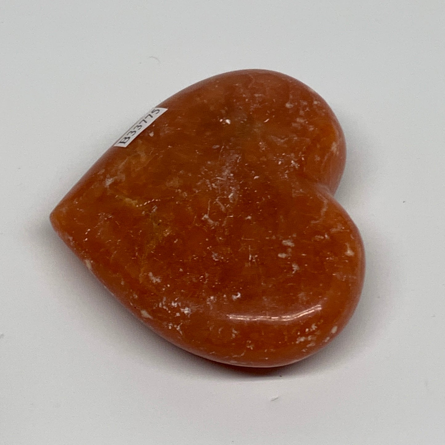 161.4g, 2.8"x3.2"x0.9" Orange Calcite Heart Gemstones from Madagascar, B33775