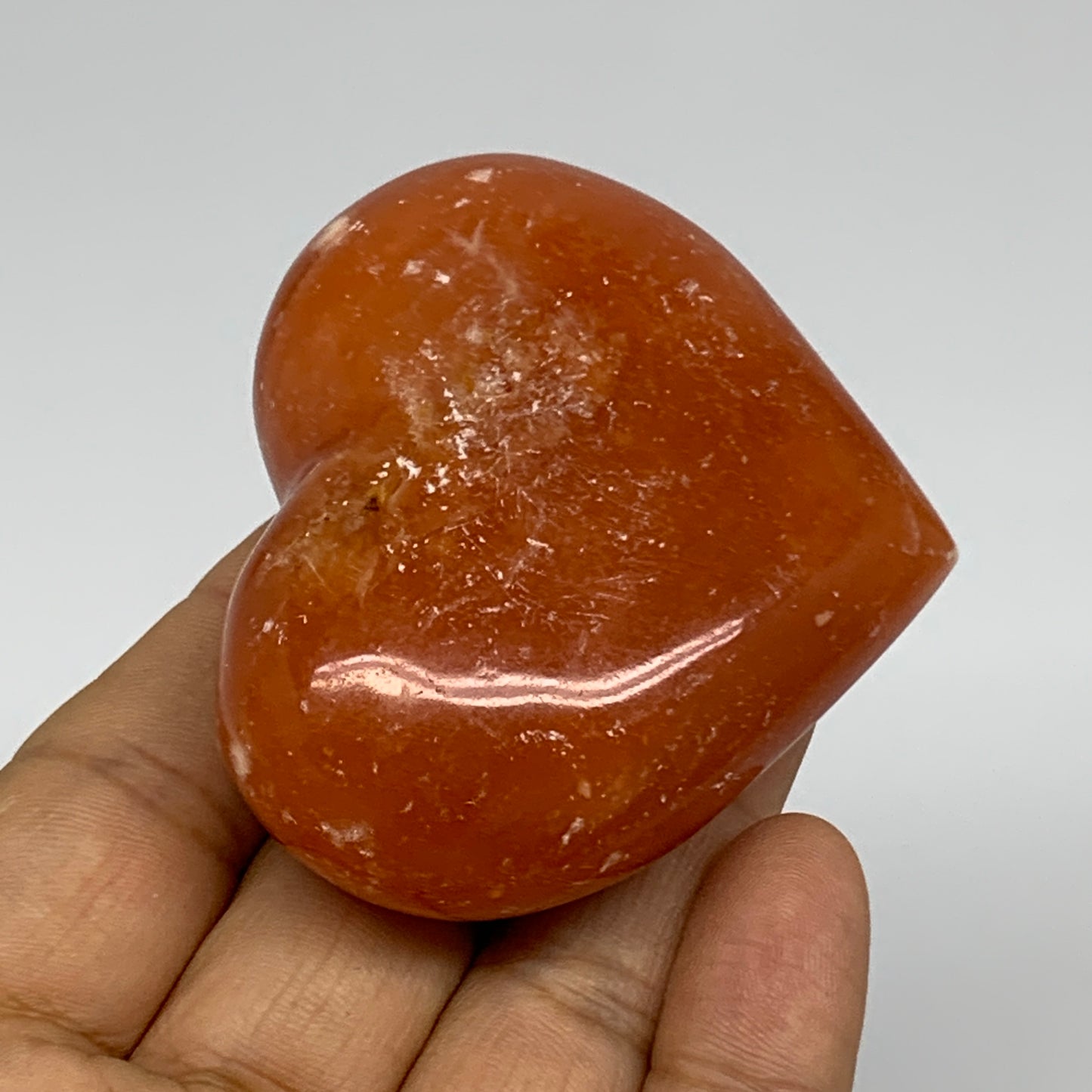 112.7g, 2.1"x2.5"x1.1" Orange Calcite Heart Gemstones from Madagascar, B33776