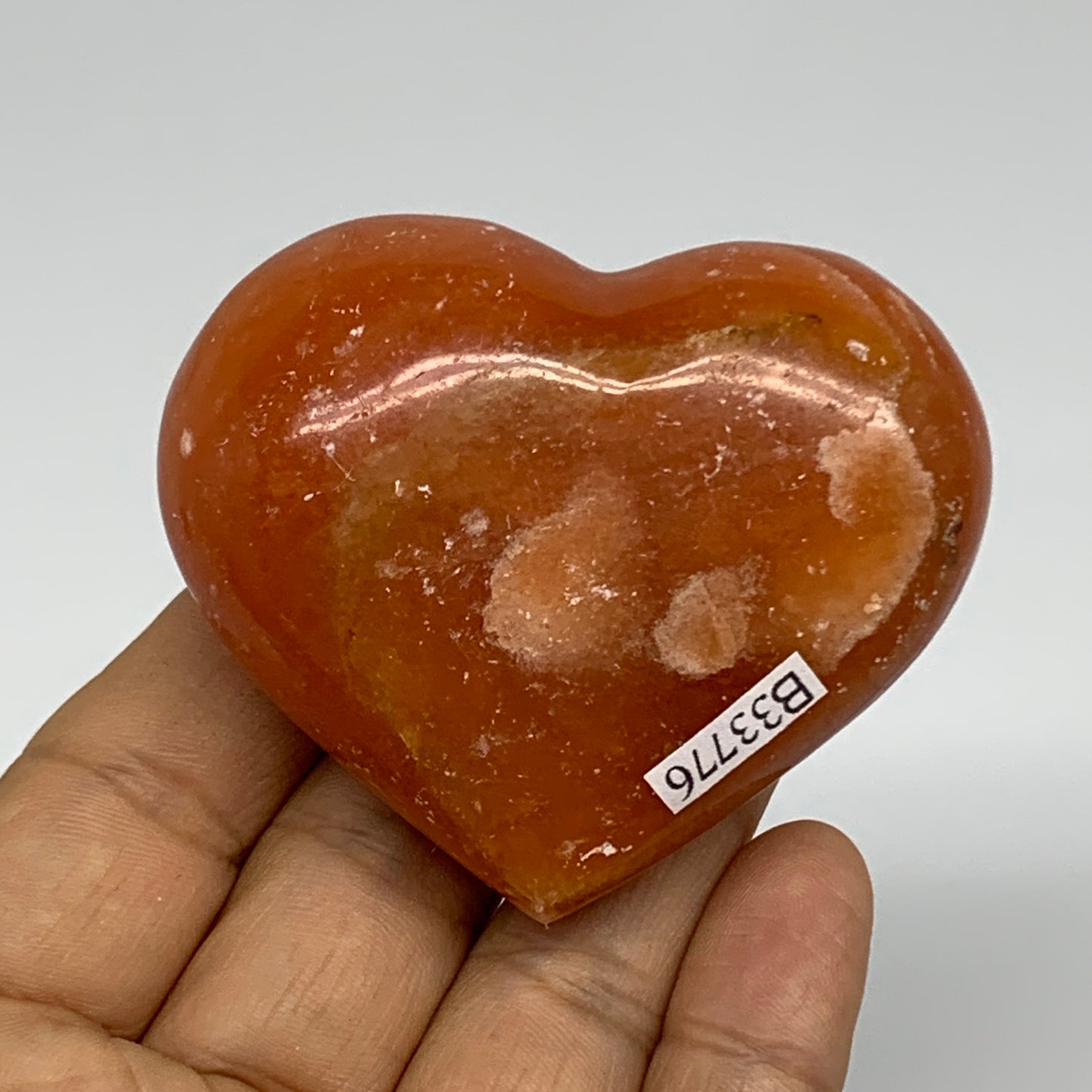 112.7g, 2.1"x2.5"x1.1" Orange Calcite Heart Gemstones from Madagascar, B33776