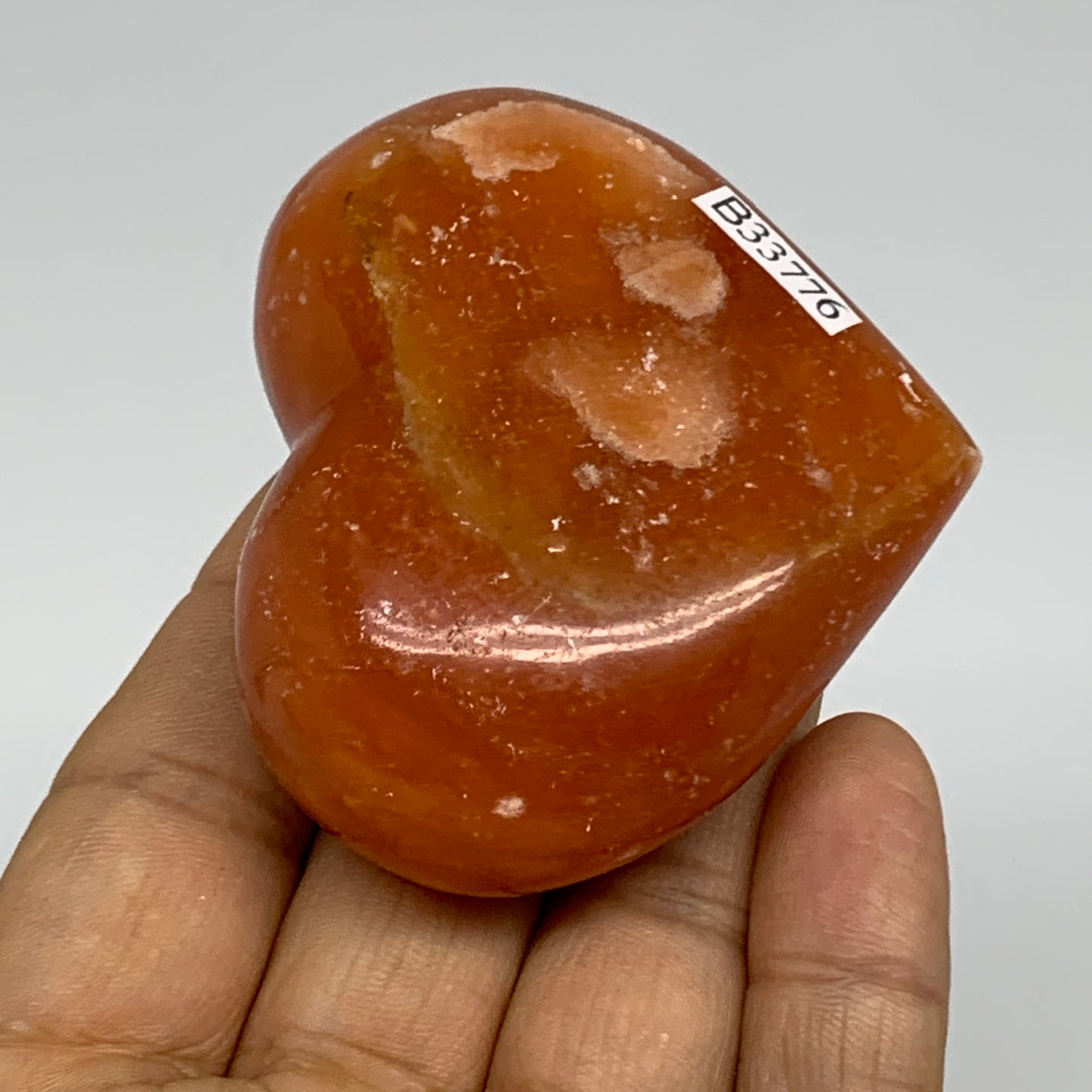 112.7g, 2.1"x2.5"x1.1" Orange Calcite Heart Gemstones from Madagascar, B33776