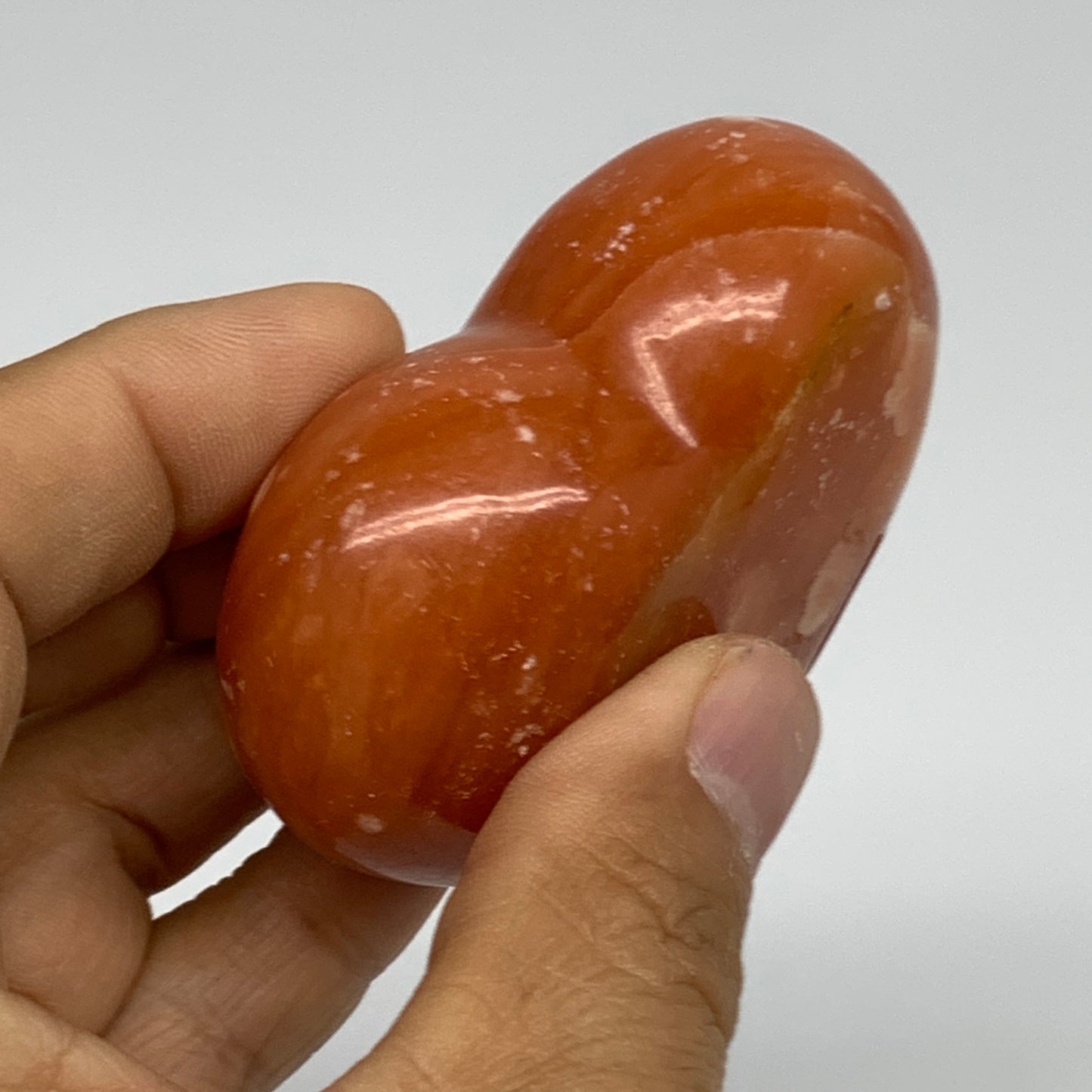 112.7g, 2.1"x2.5"x1.1" Orange Calcite Heart Gemstones from Madagascar, B33776