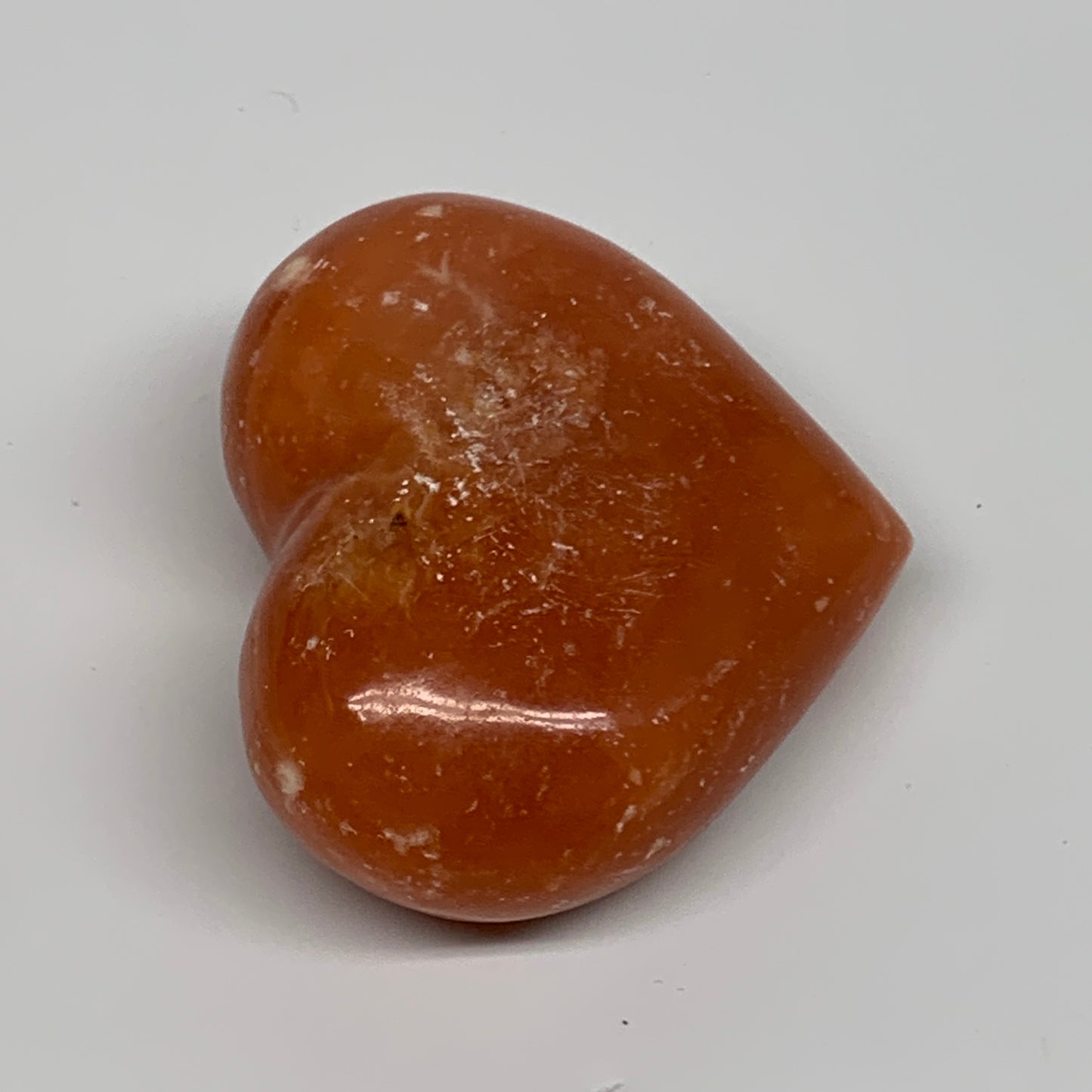 112.7g, 2.1"x2.5"x1.1" Orange Calcite Heart Gemstones from Madagascar, B33776