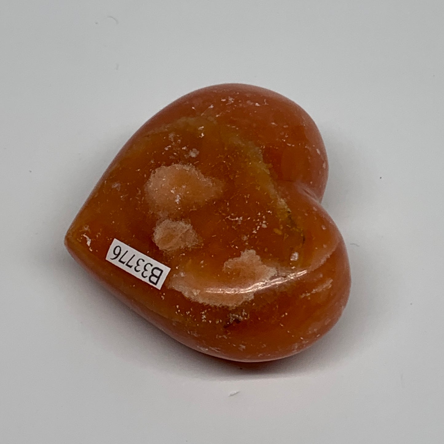 112.7g, 2.1"x2.5"x1.1" Orange Calcite Heart Gemstones from Madagascar, B33776