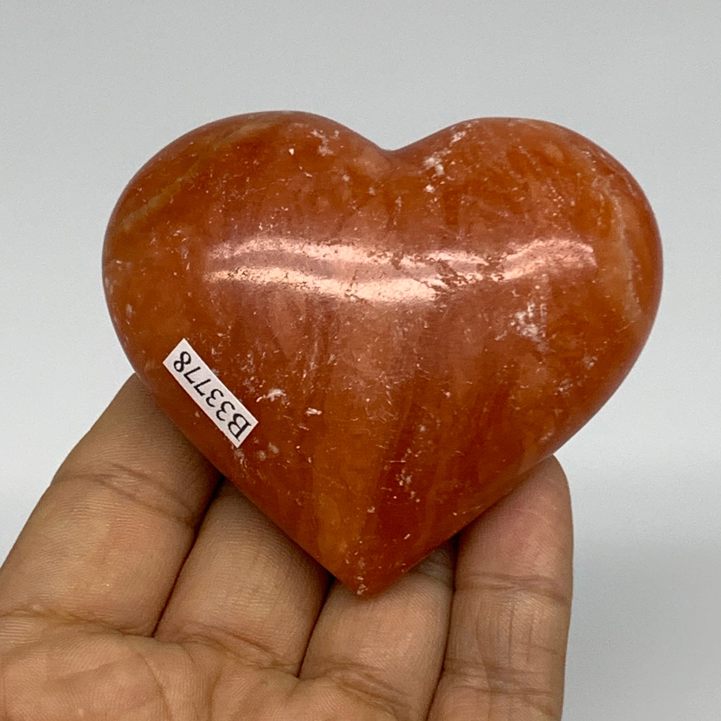 146g, 2.4"x2.8"x1.1" Orange Calcite Heart Gemstones from Madagascar, B33778
