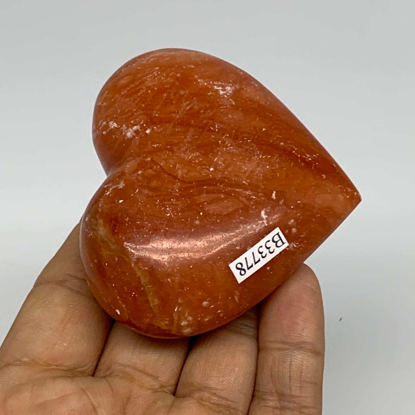 146g, 2.4"x2.8"x1.1" Orange Calcite Heart Gemstones from Madagascar, B33778