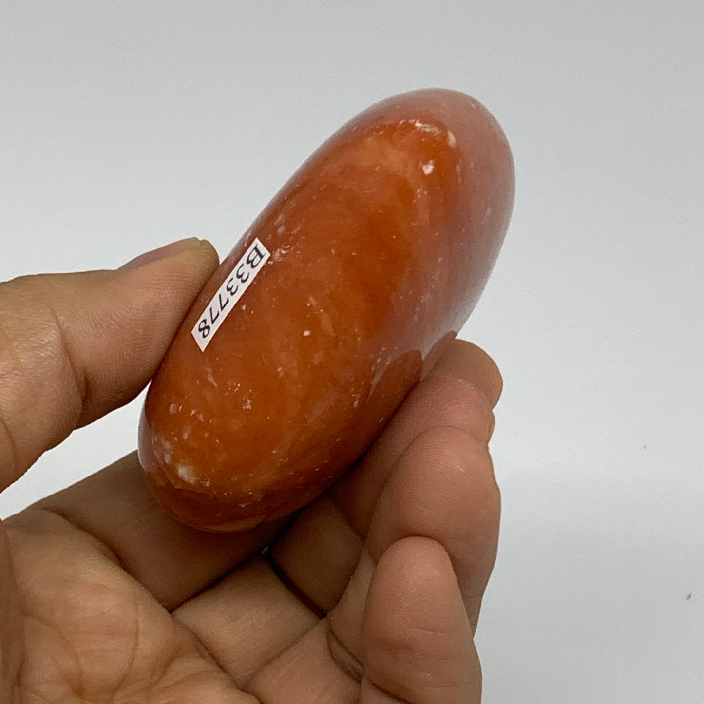 146g, 2.4"x2.8"x1.1" Orange Calcite Heart Gemstones from Madagascar, B33778