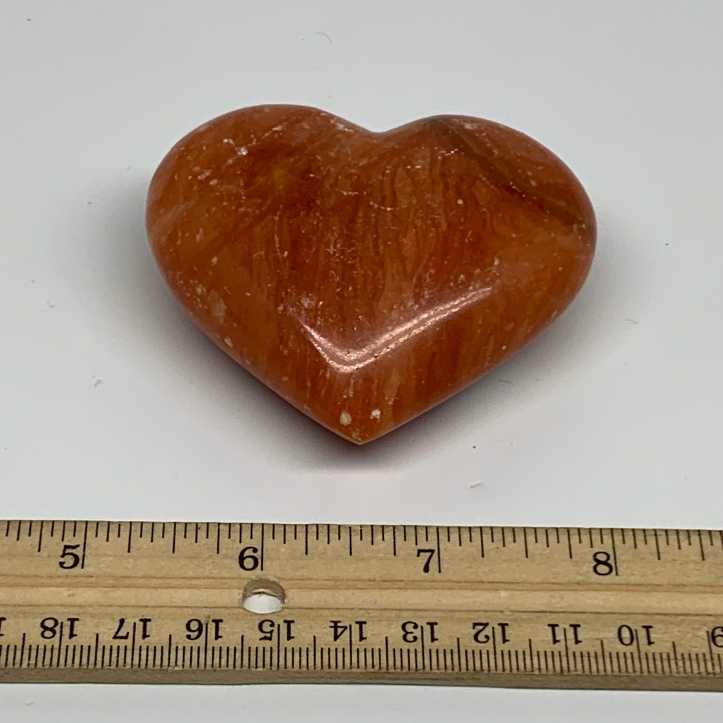 146g, 2.4"x2.8"x1.1" Orange Calcite Heart Gemstones from Madagascar, B33778