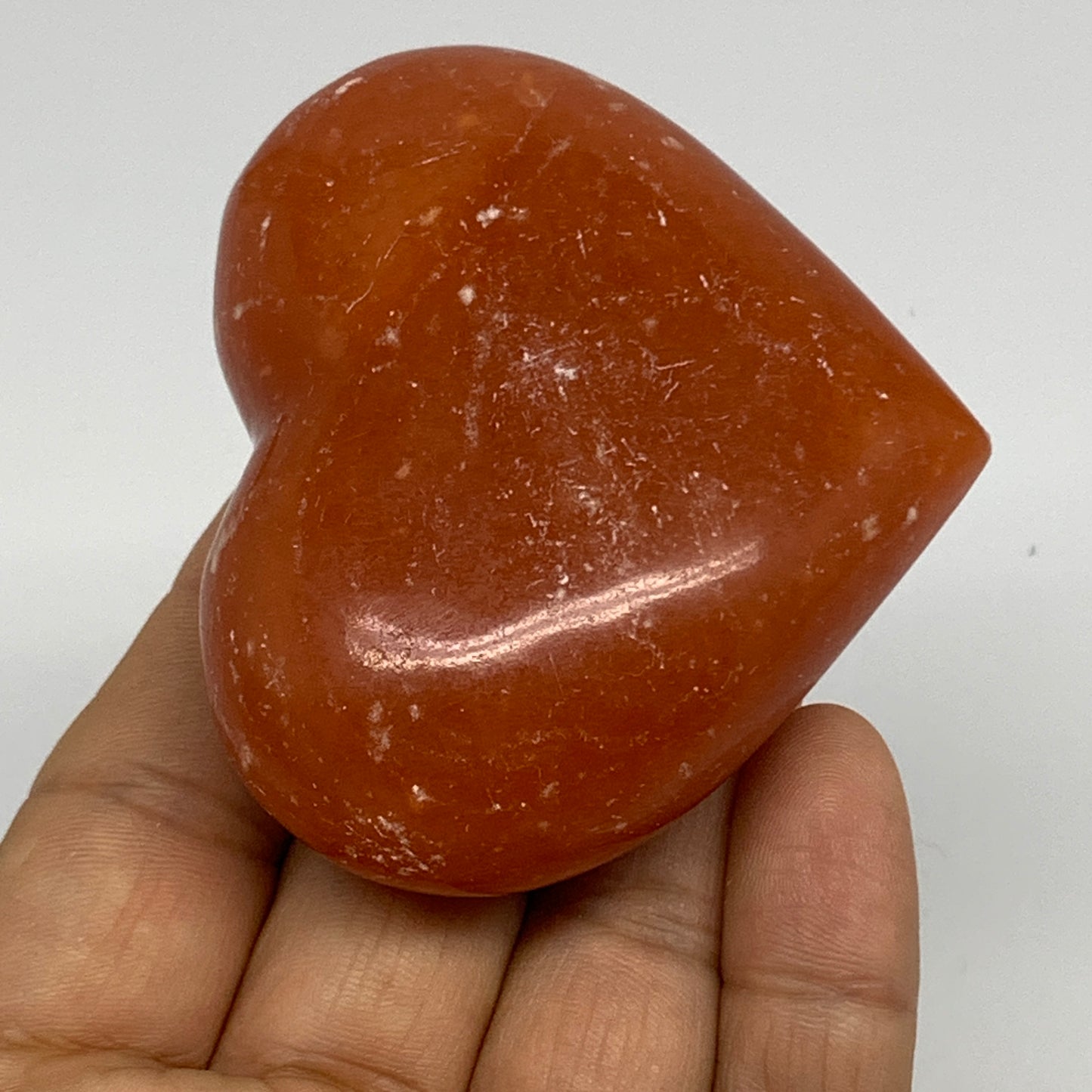 126.9g, 2.2"x2.7"x1.1" Orange Calcite Heart Gemstones from Madagascar, B33779