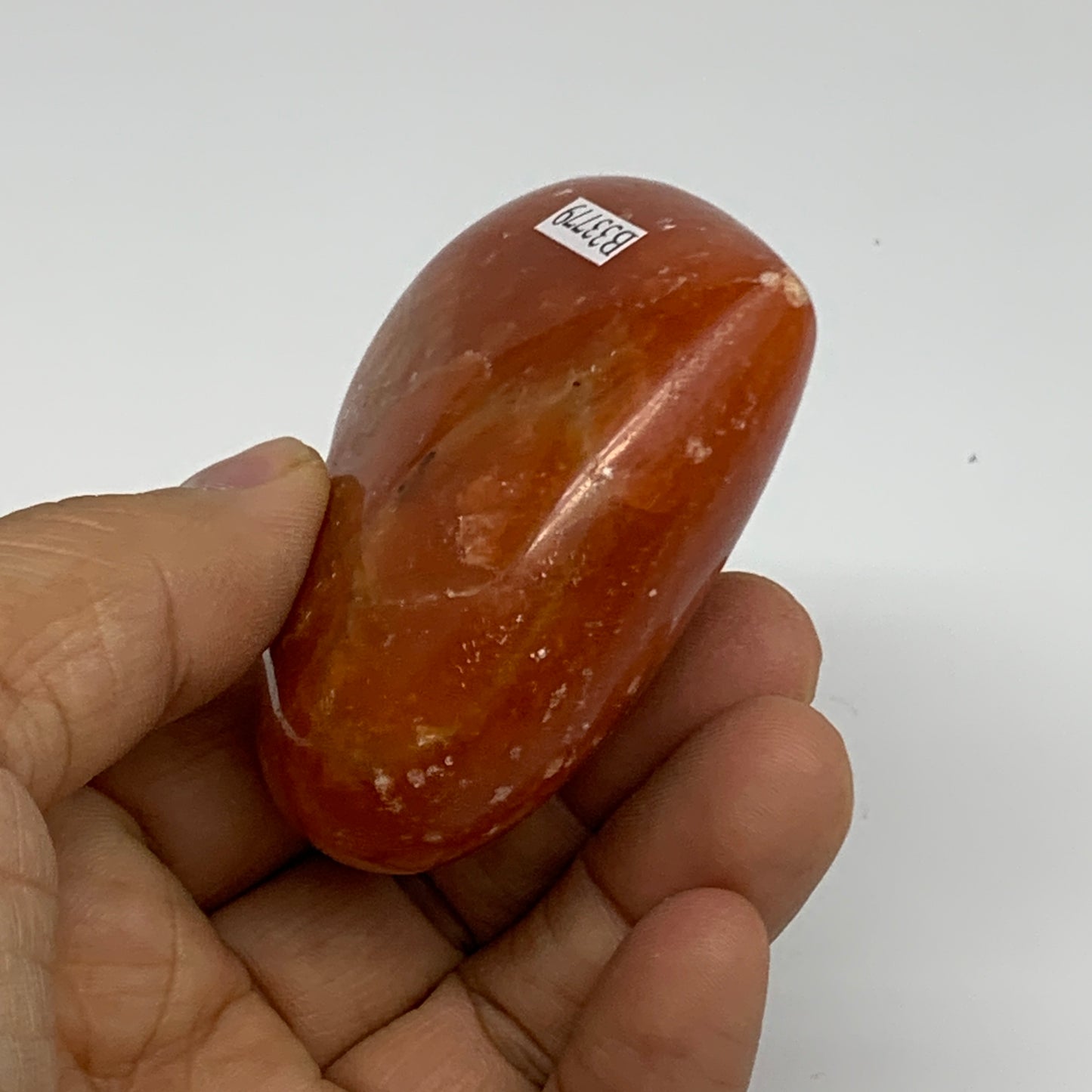 126.9g, 2.2"x2.7"x1.1" Orange Calcite Heart Gemstones from Madagascar, B33779