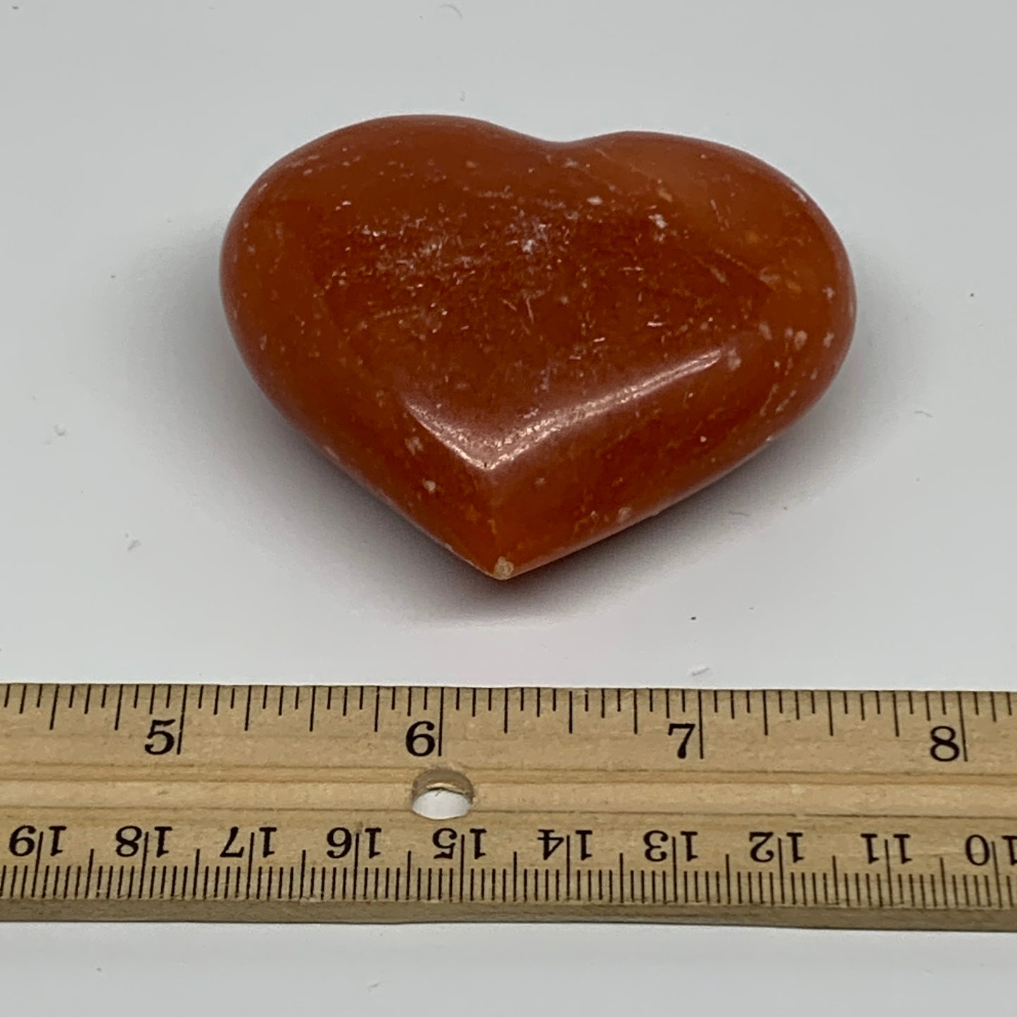 126.9g, 2.2"x2.7"x1.1" Orange Calcite Heart Gemstones from Madagascar, B33779