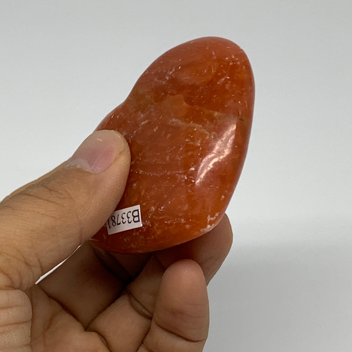 96.6g, 2.2"x2.5"x0.9" Orange Calcite Heart Gemstones from Madagascar, B33781