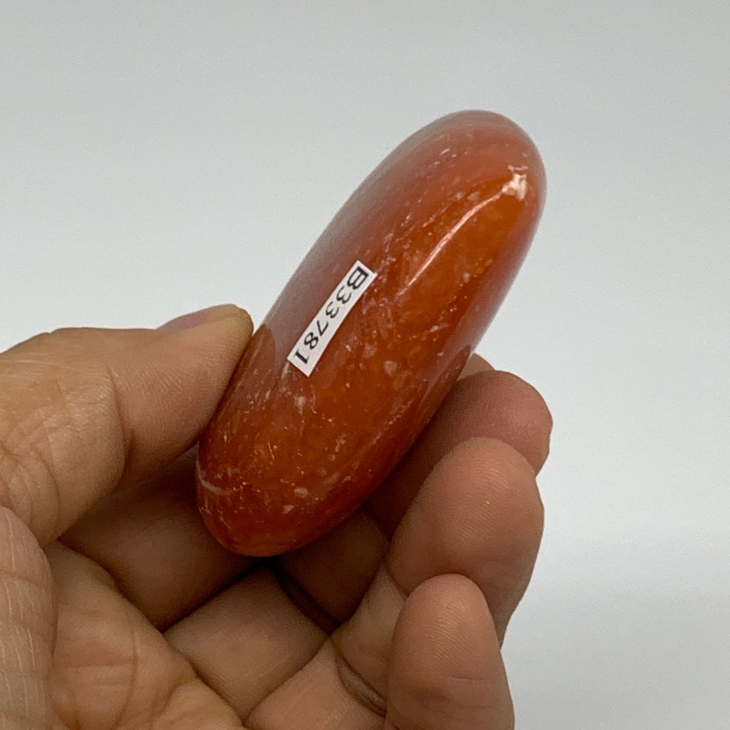 96.6g, 2.2"x2.5"x0.9" Orange Calcite Heart Gemstones from Madagascar, B33781