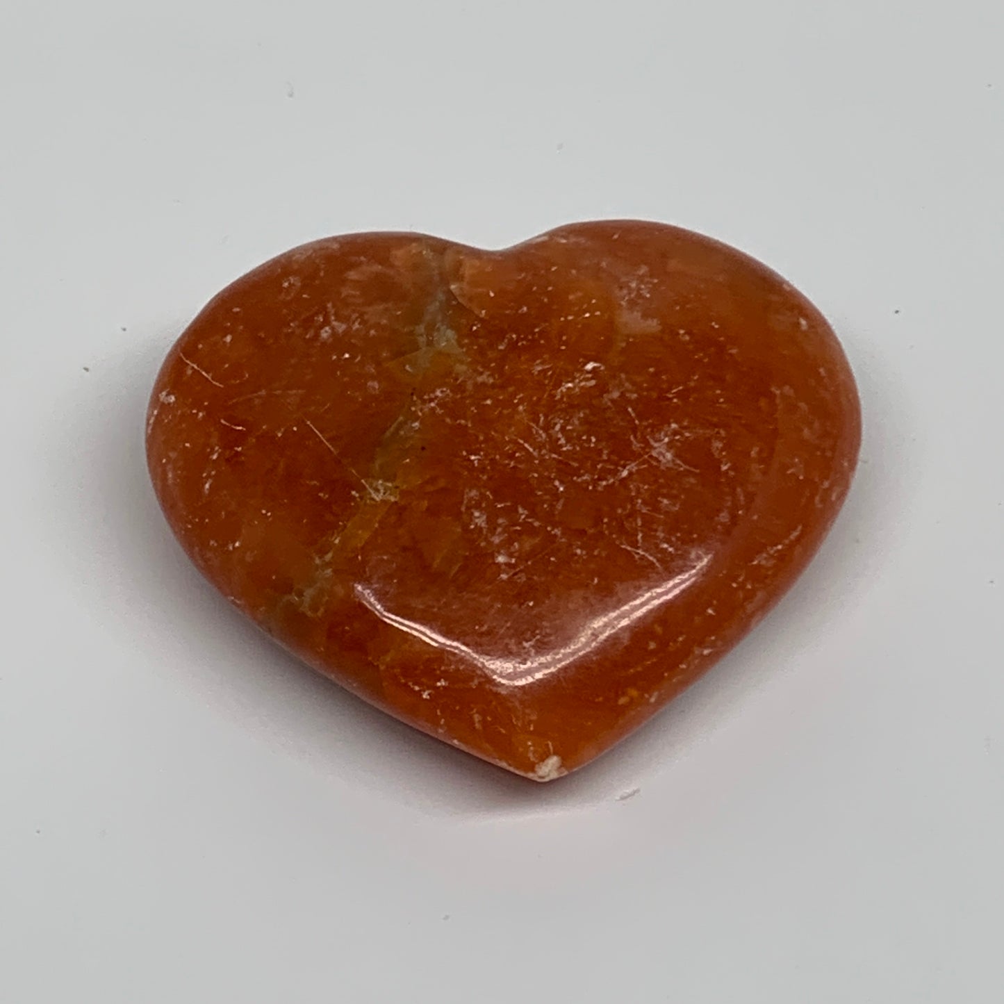 96.6g, 2.2"x2.5"x0.9" Orange Calcite Heart Gemstones from Madagascar, B33781