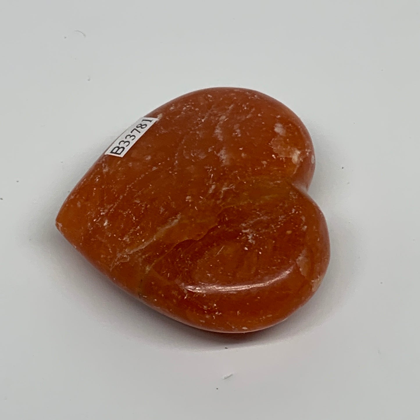 96.6g, 2.2"x2.5"x0.9" Orange Calcite Heart Gemstones from Madagascar, B33781